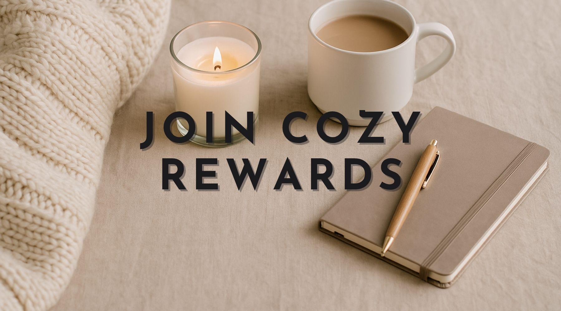 Cozy flatlay with blanket, candle, coffee, and journal on beige linen background. Text reads “Join Cozy Rewards” for Durazza’s loyalty rewards program.