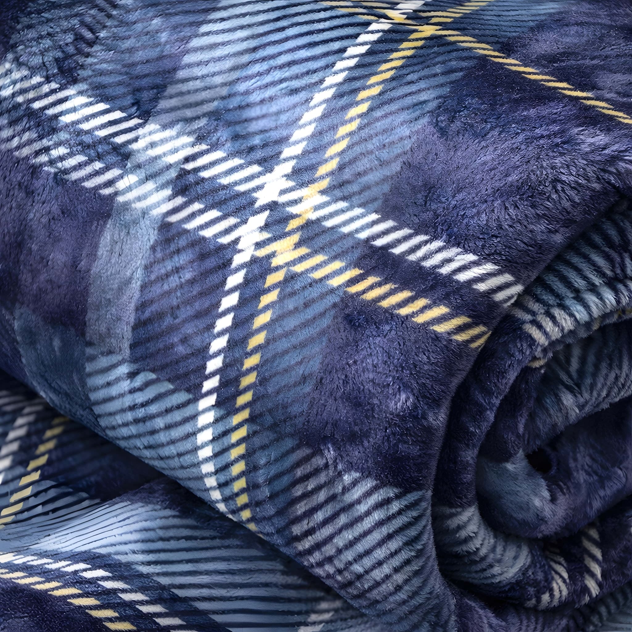 Folded blue plaid throw blanket with yellow and white lines