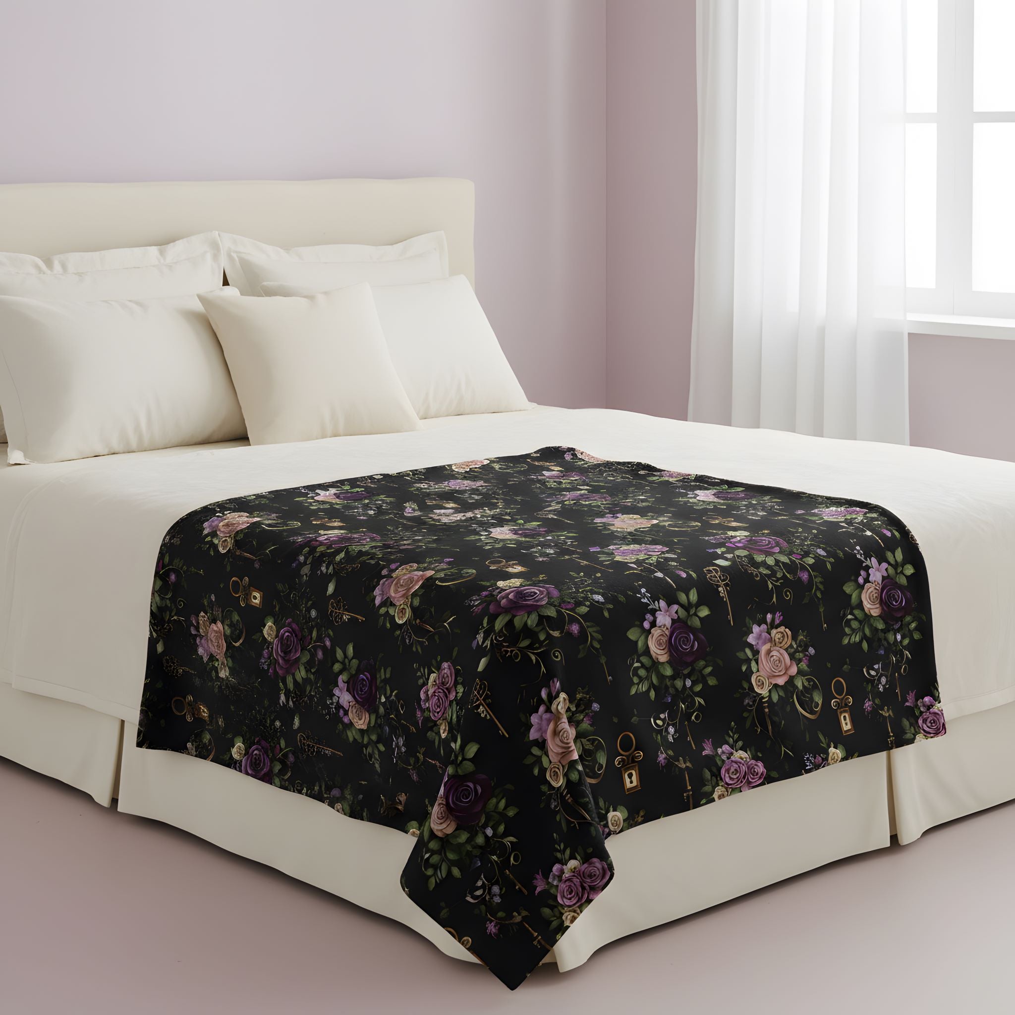 Gothic floral throw blanket draped over a bed with dark botanical pattern and antique keys.