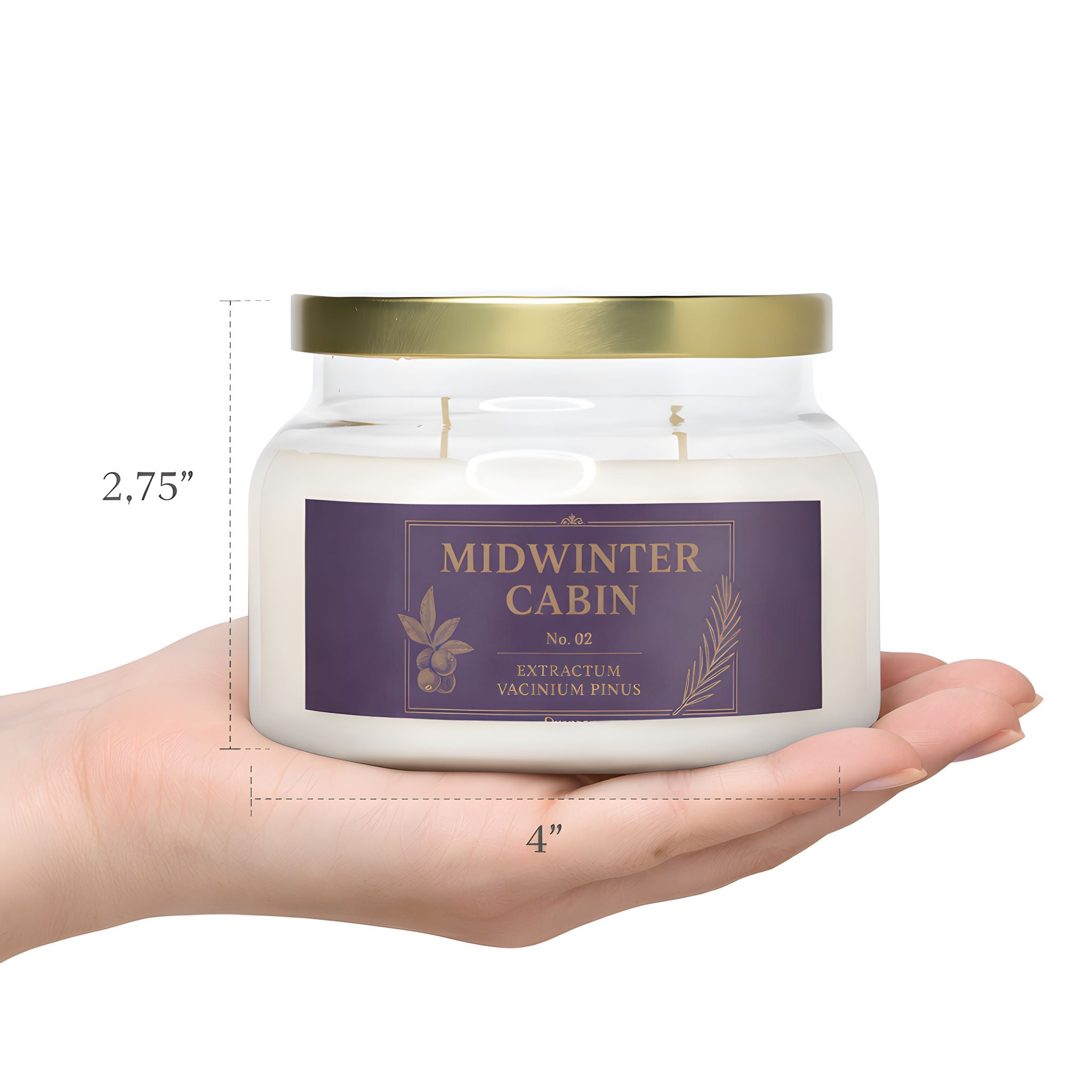 A person's hand holding the Midwinter cabin Christmas candle in cranberry pine scent.