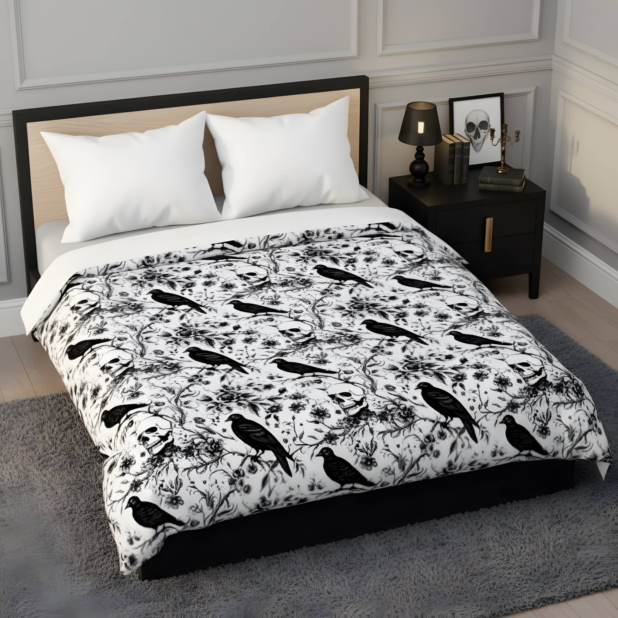 Modern black and white bedroom with gothic bedding featuring a skull and raven.