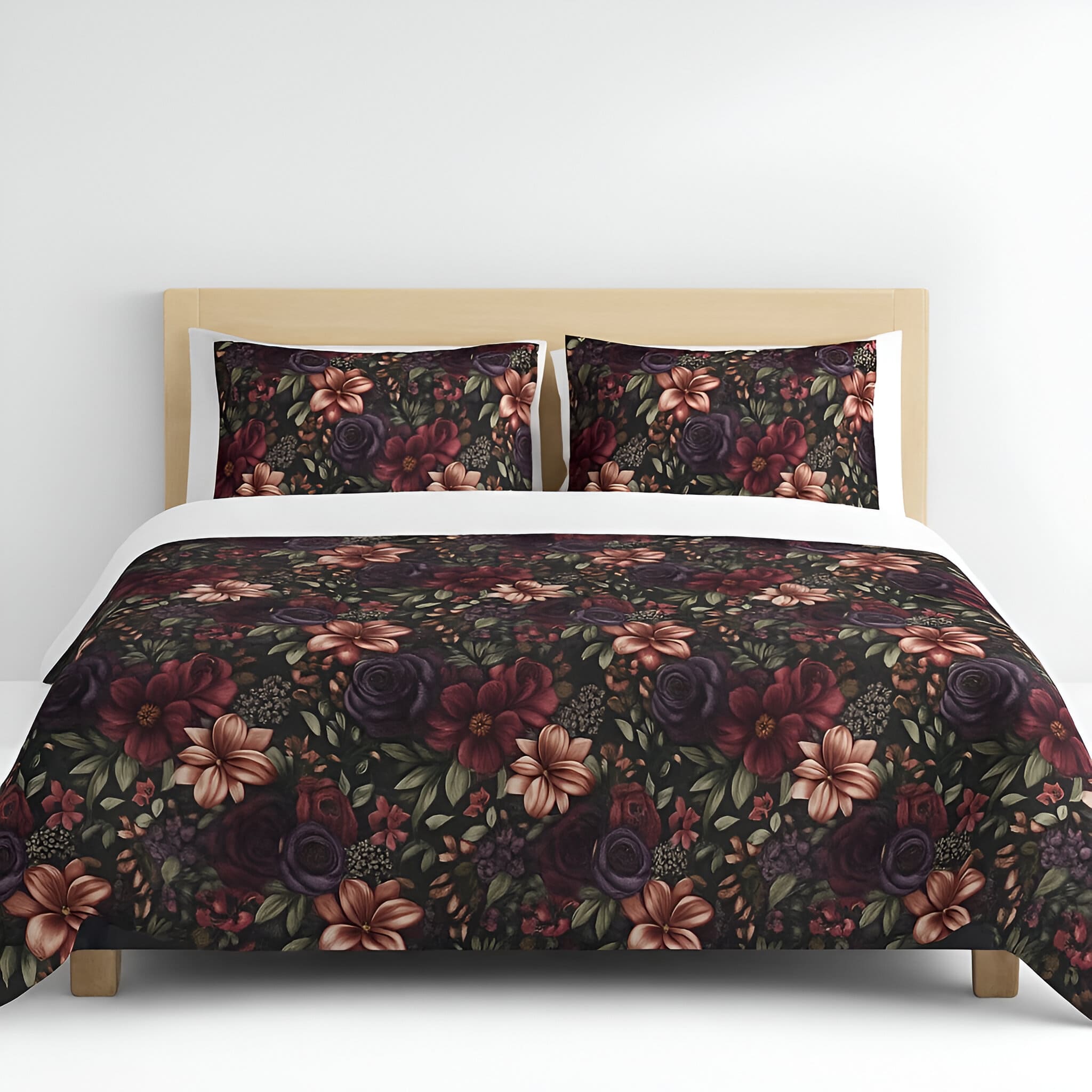 Dark cottagecore floral bedding set with dark colors on a bed with a wooden headboard.