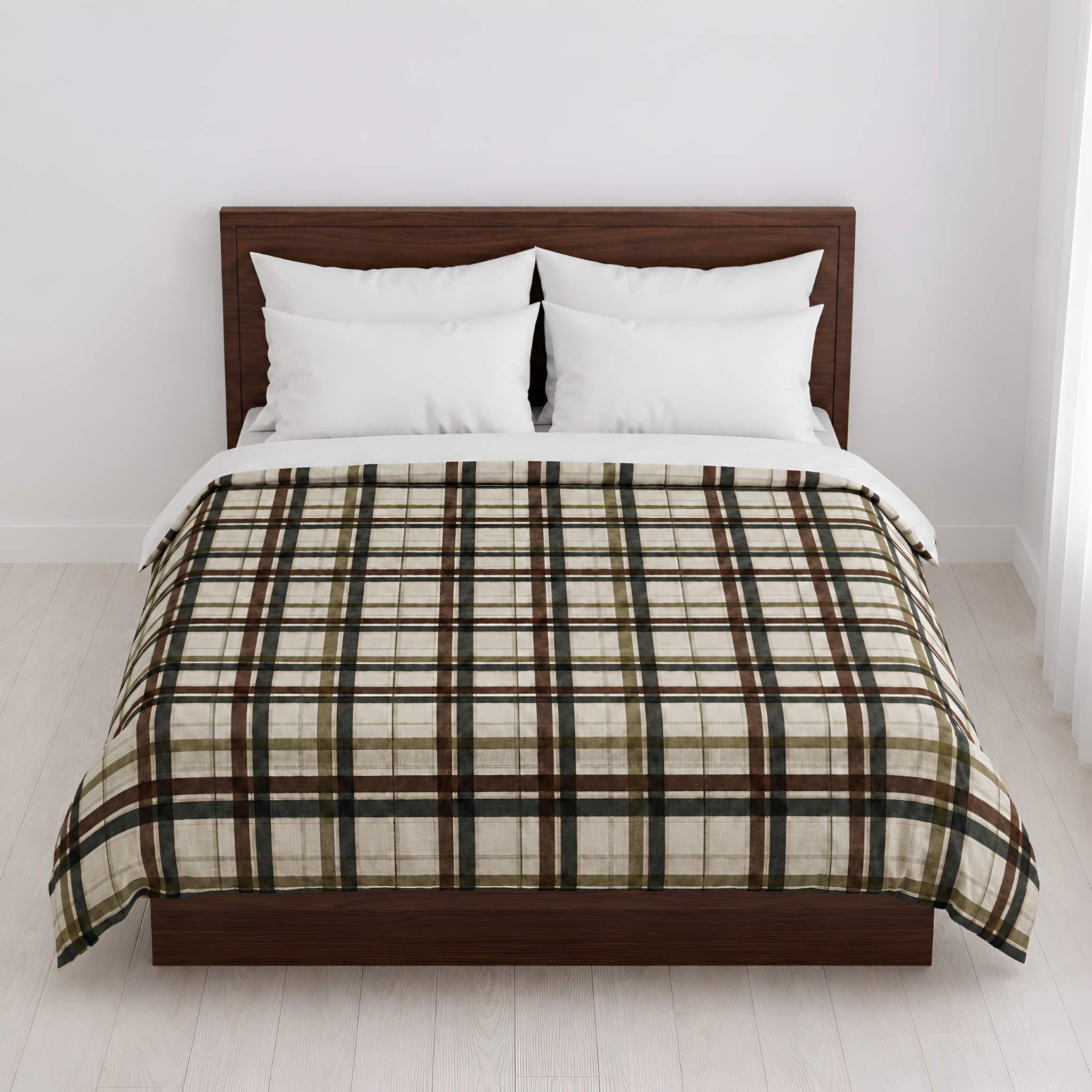 A bed dressed with a plaid duvet in beige, brown, and green tones, styled with white pillows and white sheets on a dark wood platform bed frame against a white wall.