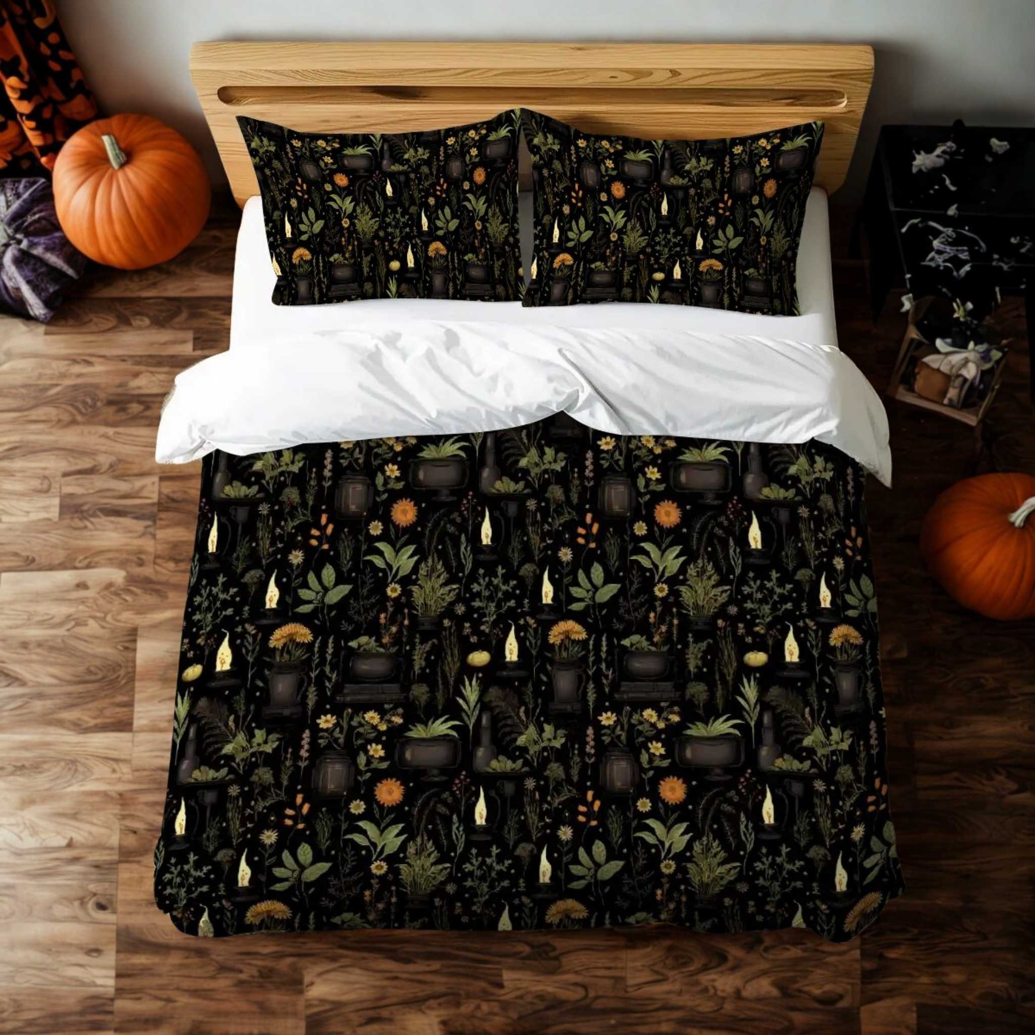 A duvet cover with a dark botanical design, featuring mystical herbs and candles, displayed on a bed with pumpkins and vintage books around it, indicating a witchy and gothic aesthetic.