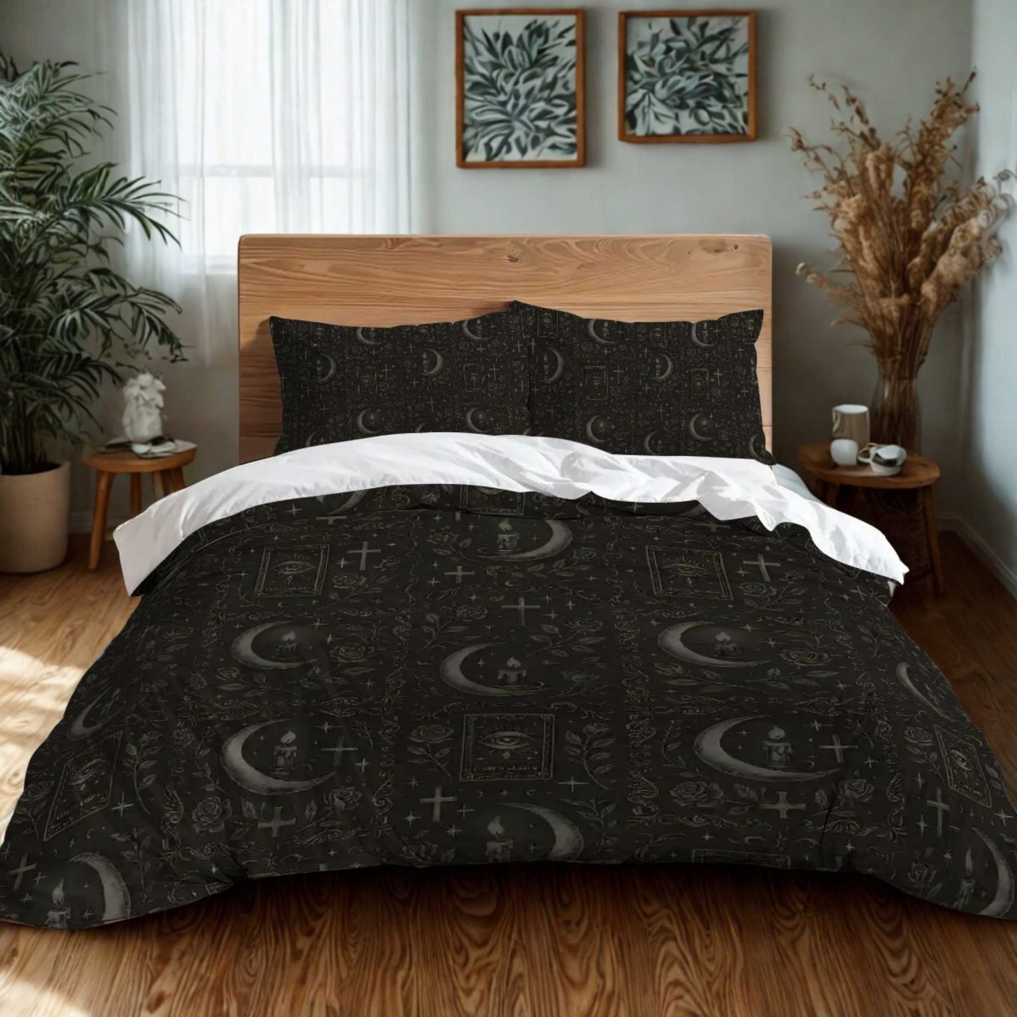 Bed with black patterned duvet and pillowcases in a bedroom setting.