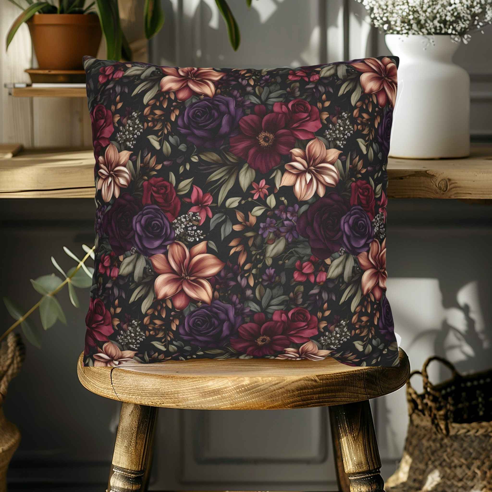 Floral-patterned pillow on a wooden stool with a blurred indoor background