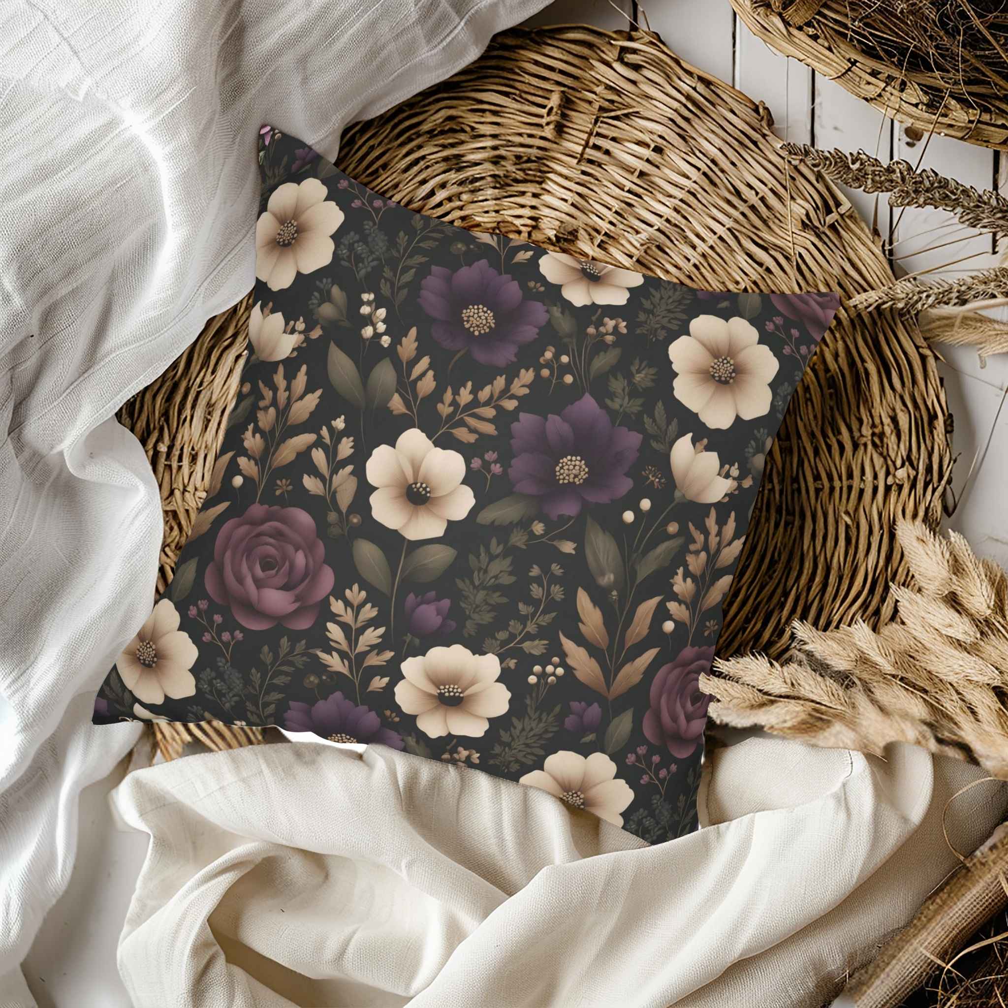 Floral-patterned pillow on a bed with white bedding and wicker basket.