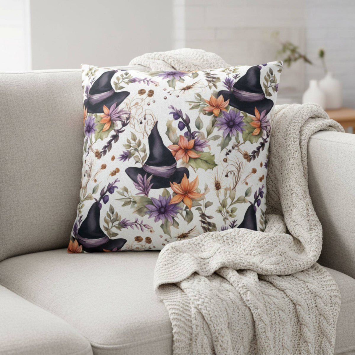 Whimsigoth Halloween pillow cover styled with neutral sofa and cream throw blanket.