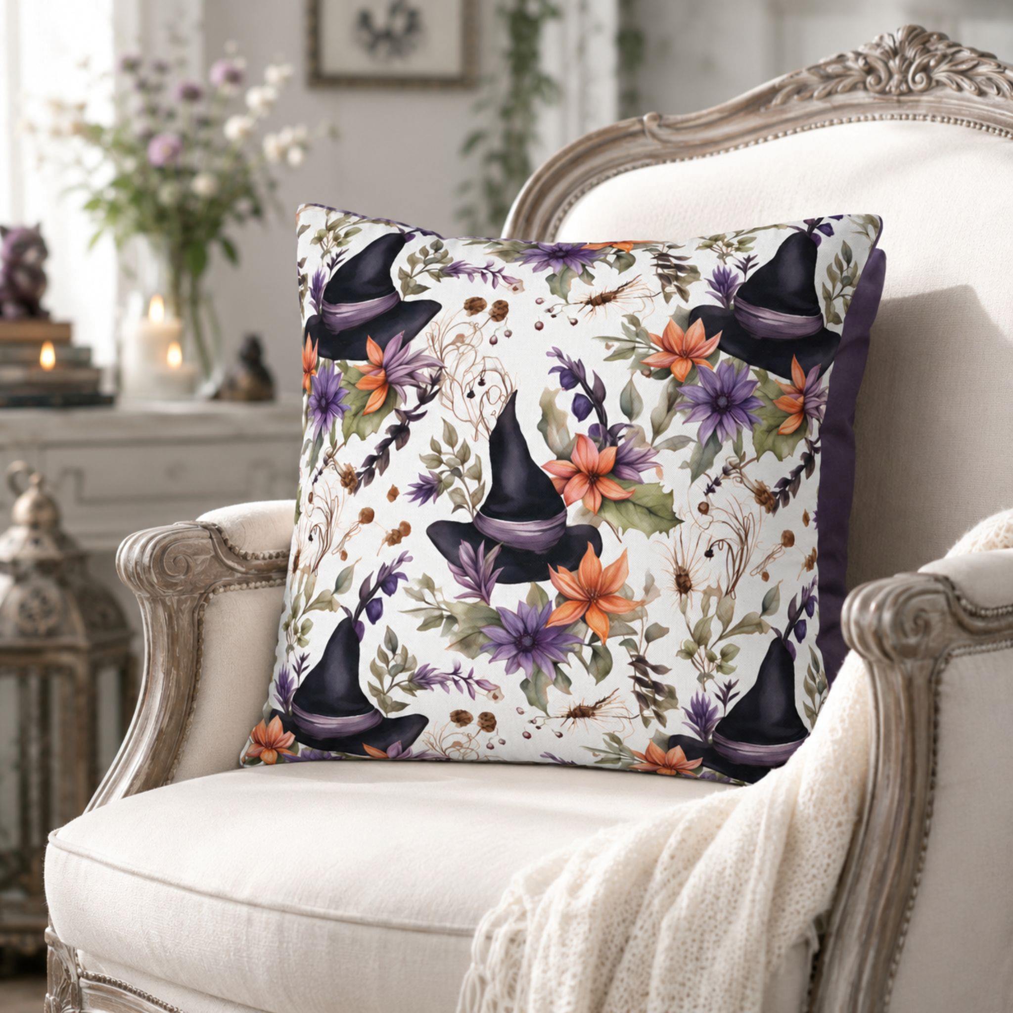 Whimsigoth pillow cover styled with flowers, witch hats, and soft neutral chair.