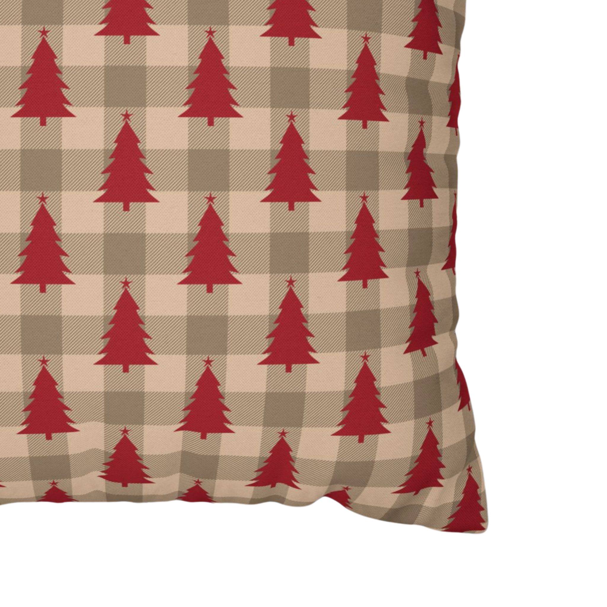 Close-up of red Christmas tree plaid pillow cover on taupe fabric.