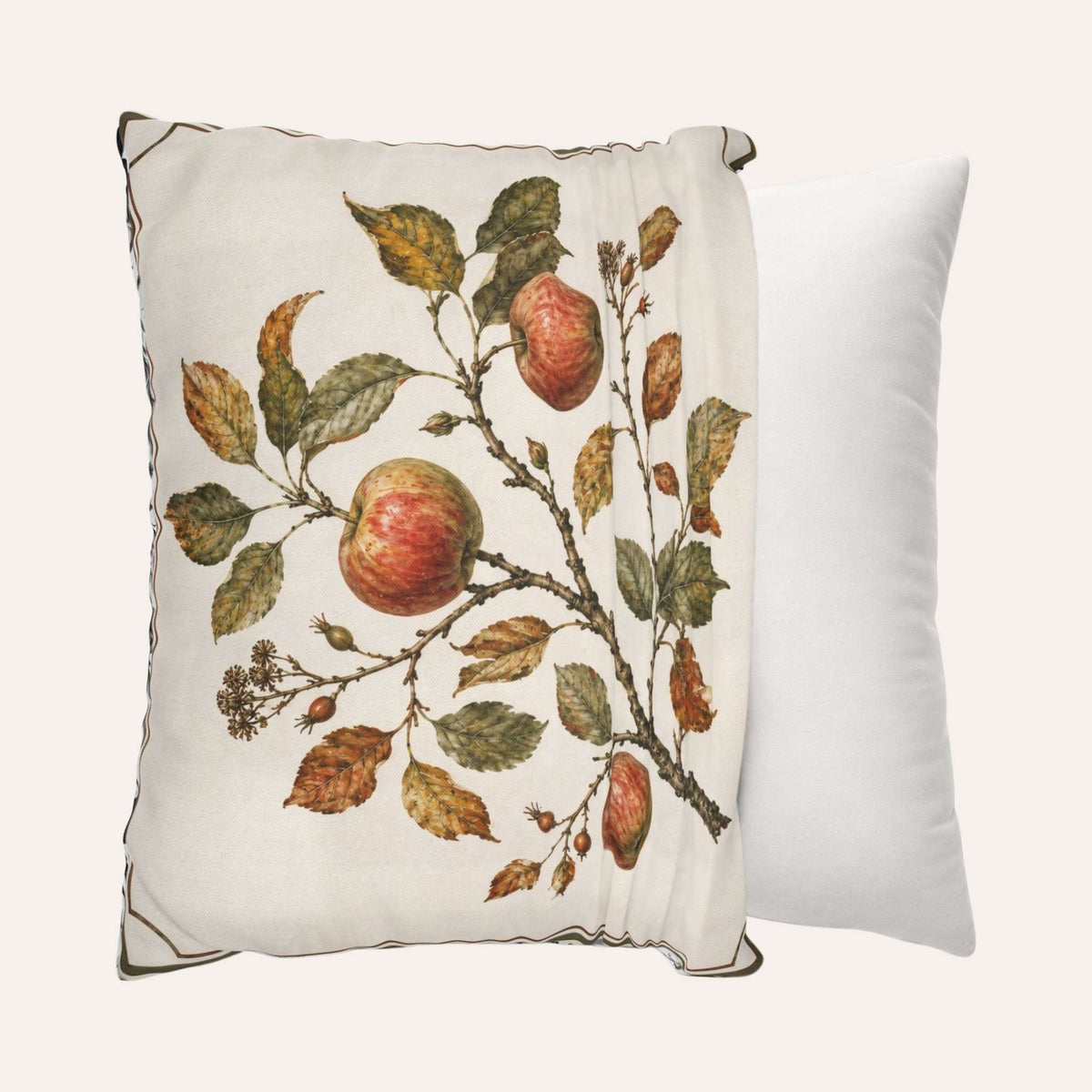 A square decorative pillow cover is being put onto a throw pillow.