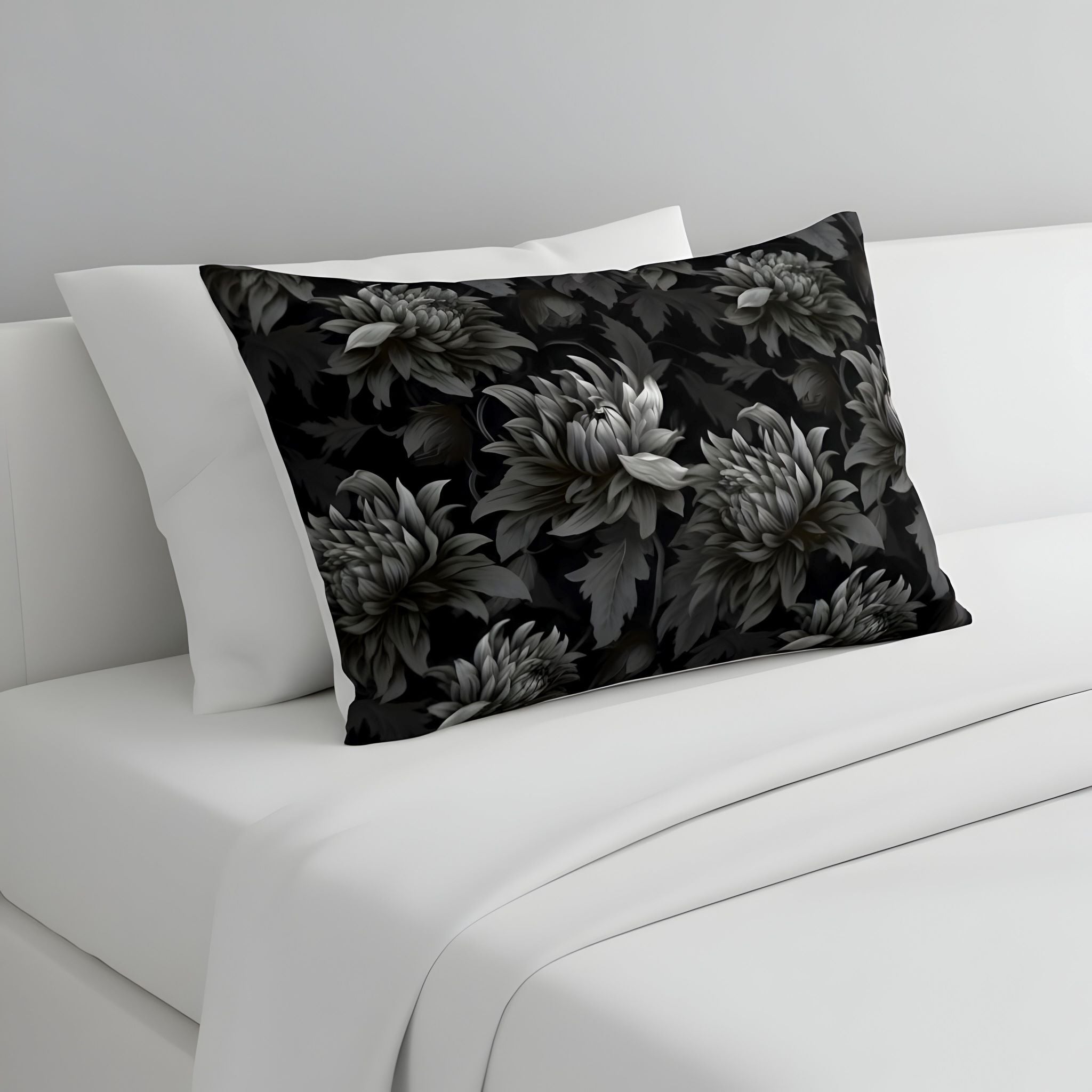 Dark Floral pillow sham on a white bed.
