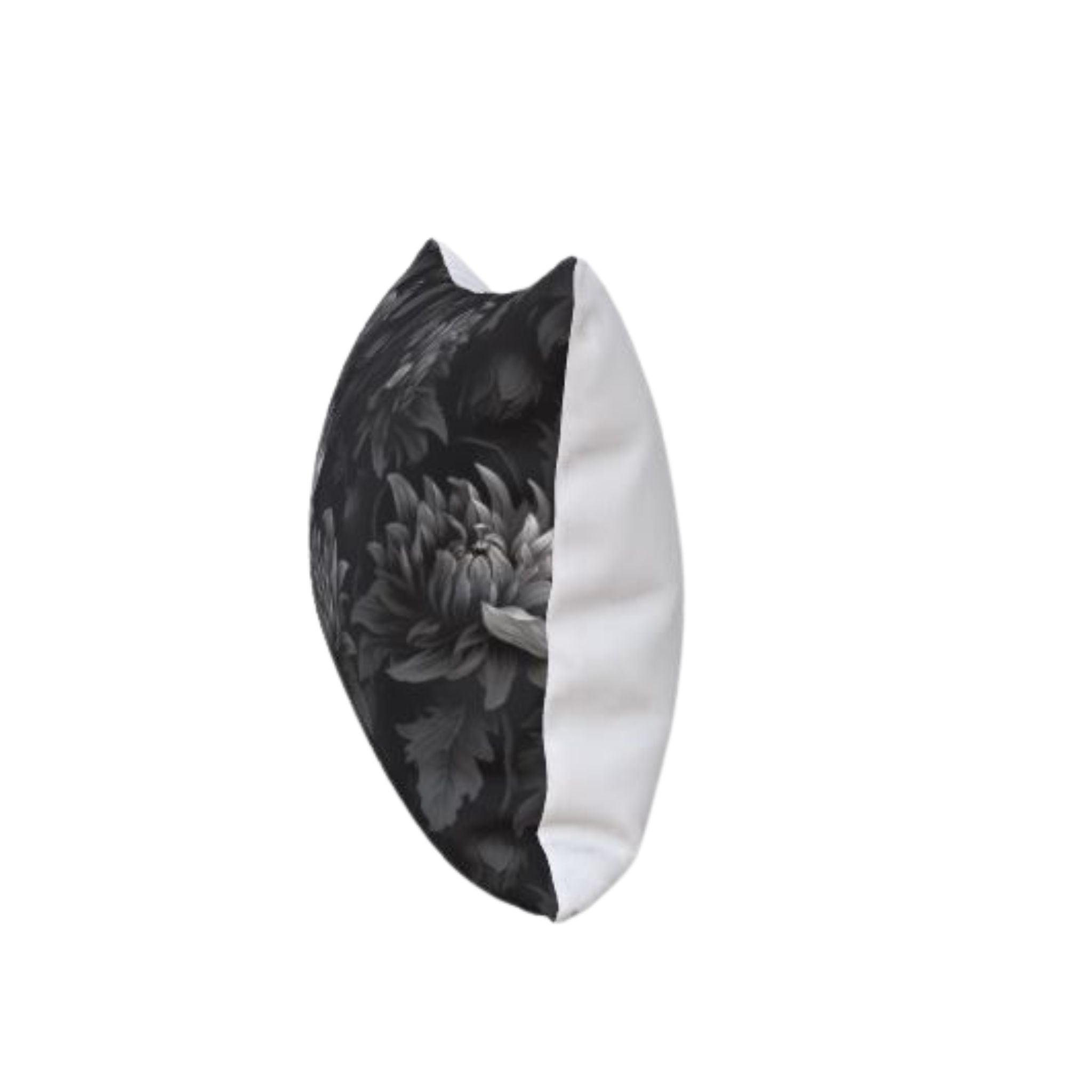 Side angle of moody botanical pillow sham with black floral pattern on a white background