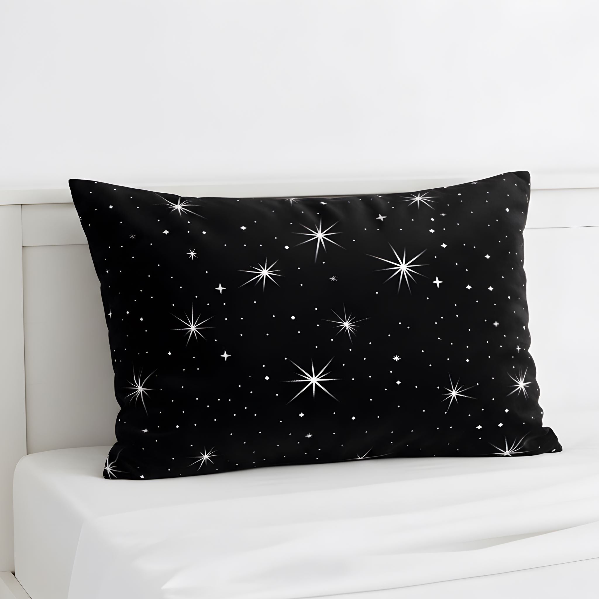 Black and white pillow sham with star design.