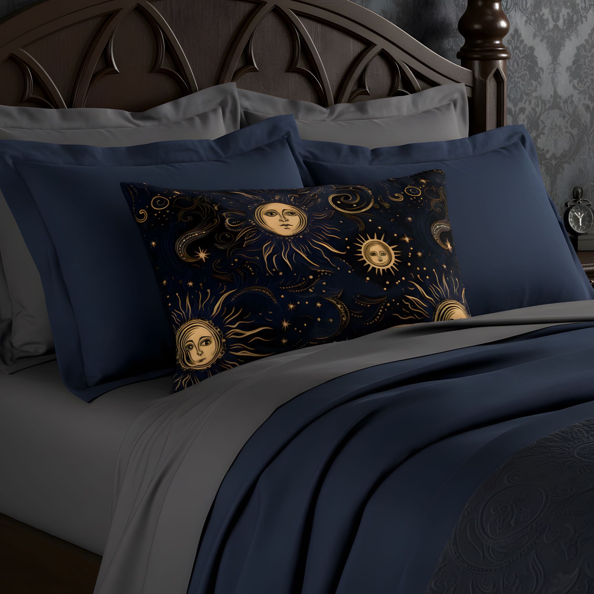Sun and moon pillow sham styled with navy bedding in a gothic bedroom