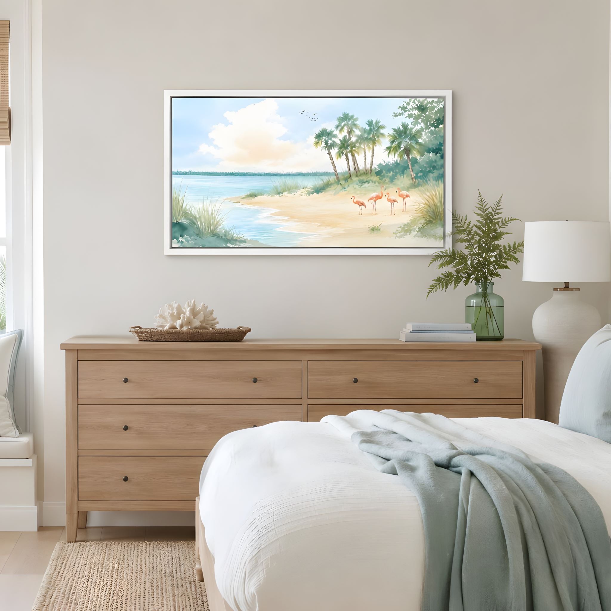 Bedroom with wooden dresser, painting of a beach scene, and decorative items.
