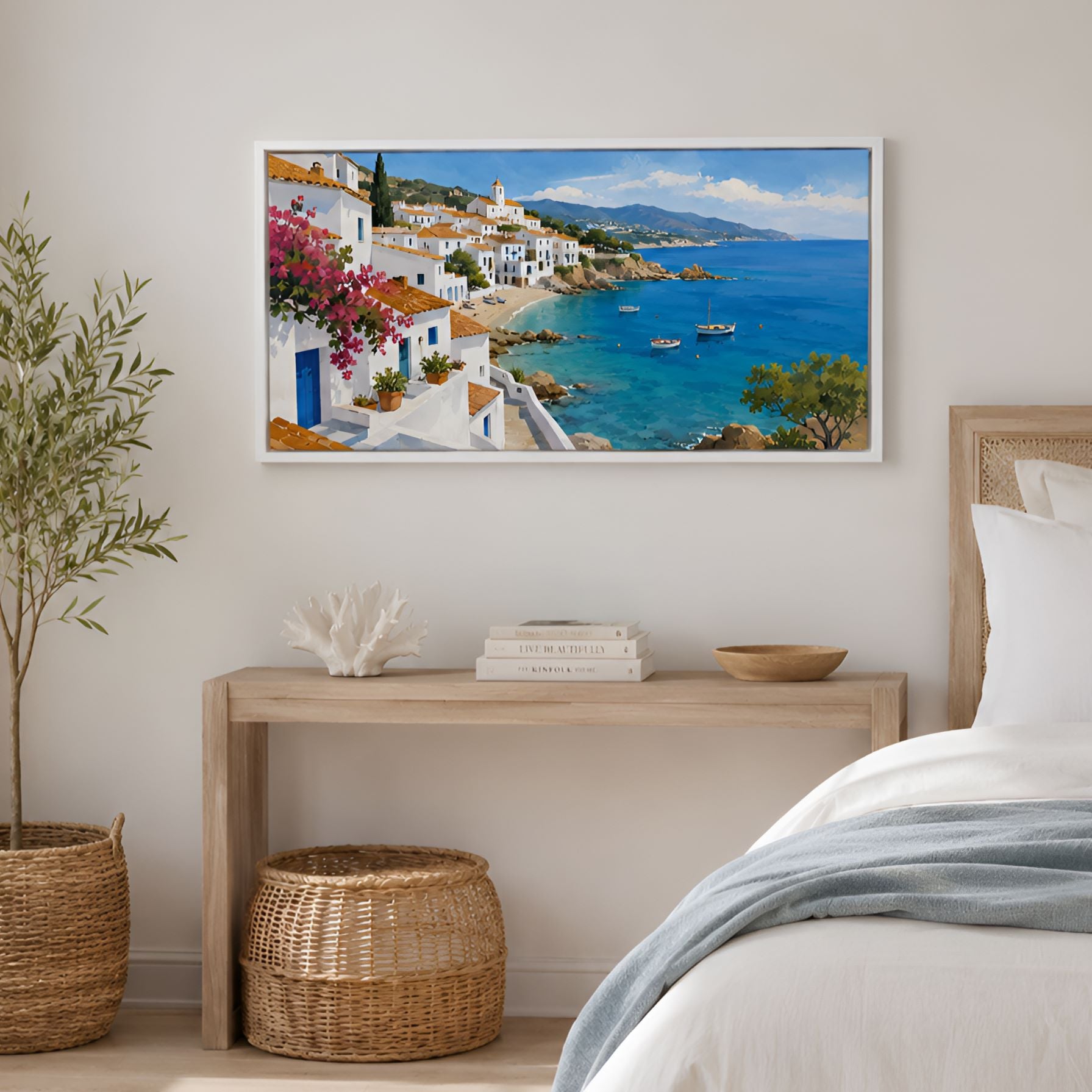 Azurea coastal canvas wall art styled above wood console with baskets and greenery in a seaside bedroom.
