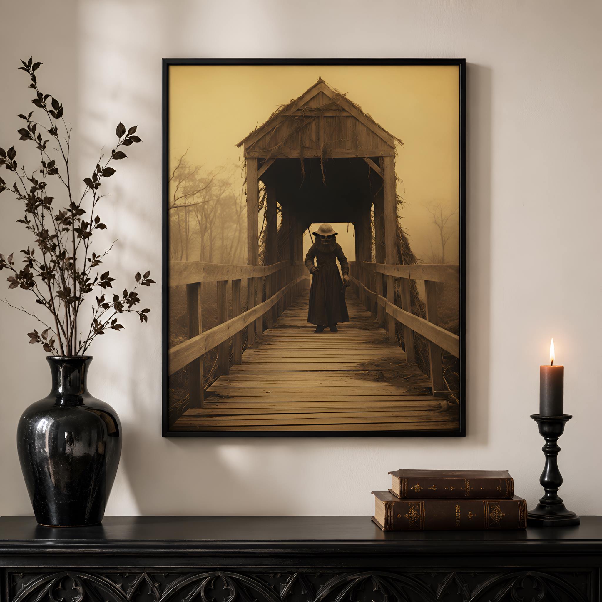 Horror art of a vintage photograph of a covered bridge with a person walking on it, displayed on a wall above a decorative shelf.
