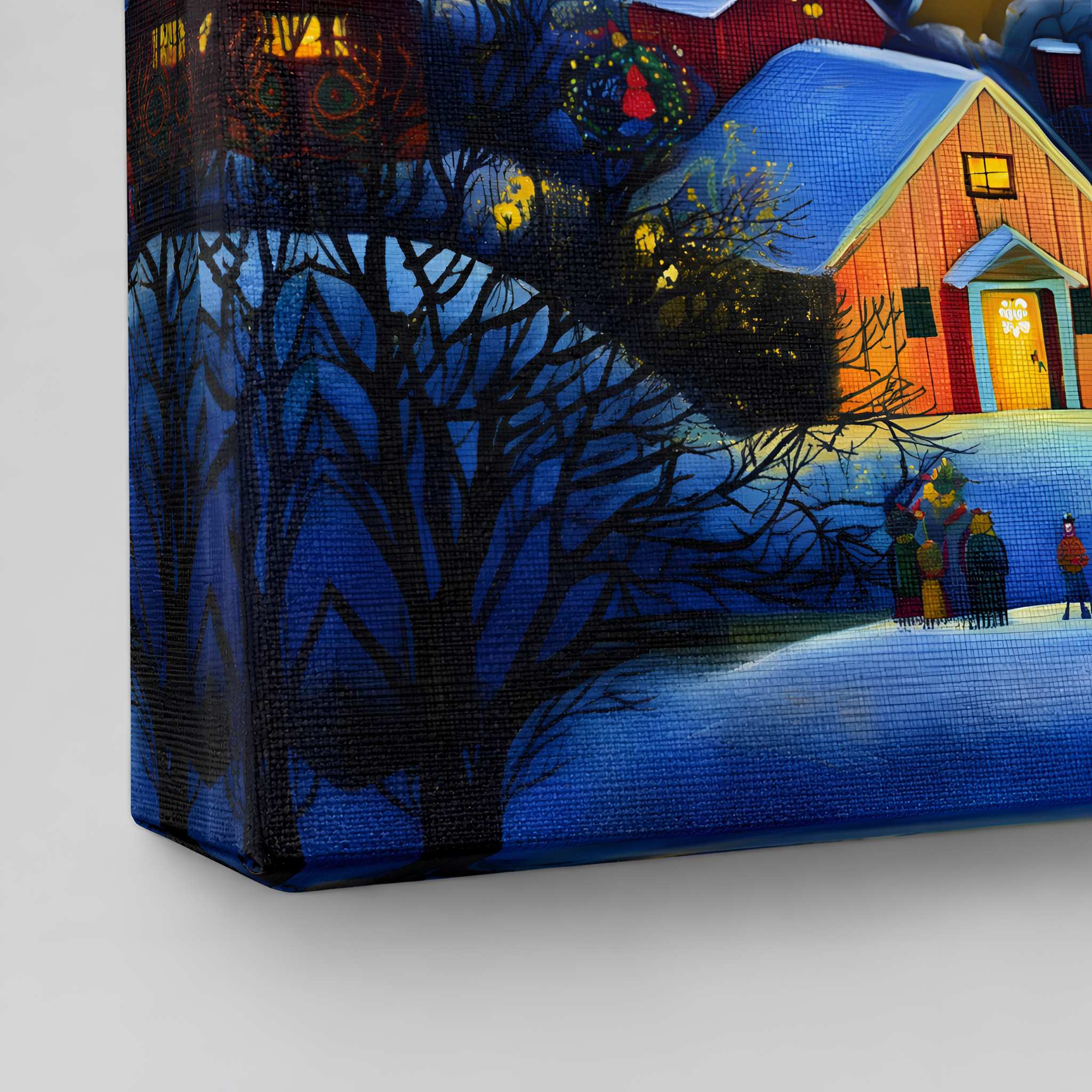 Canvas Christmas print of a winter scene with houses and people, featuring dark blue and orange colors.