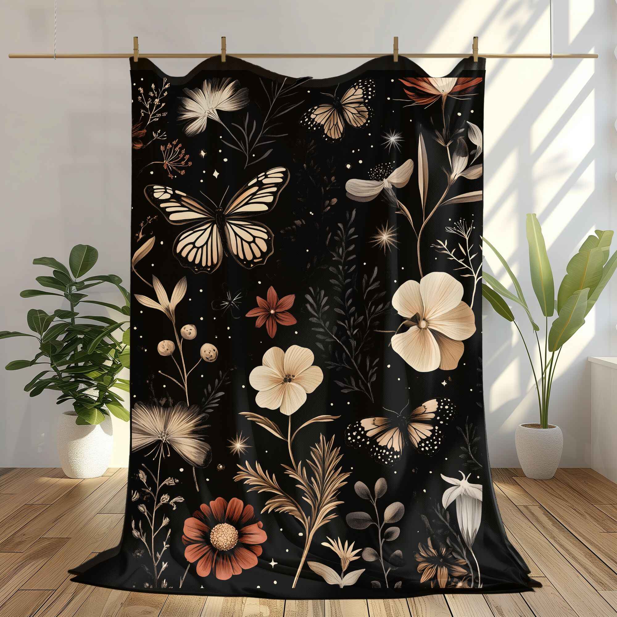 A throw blanket with a floral and butterfly pattern, displayed on a wooden hanger, showcasing a mix of pastel and vibrant colors on a dark background.