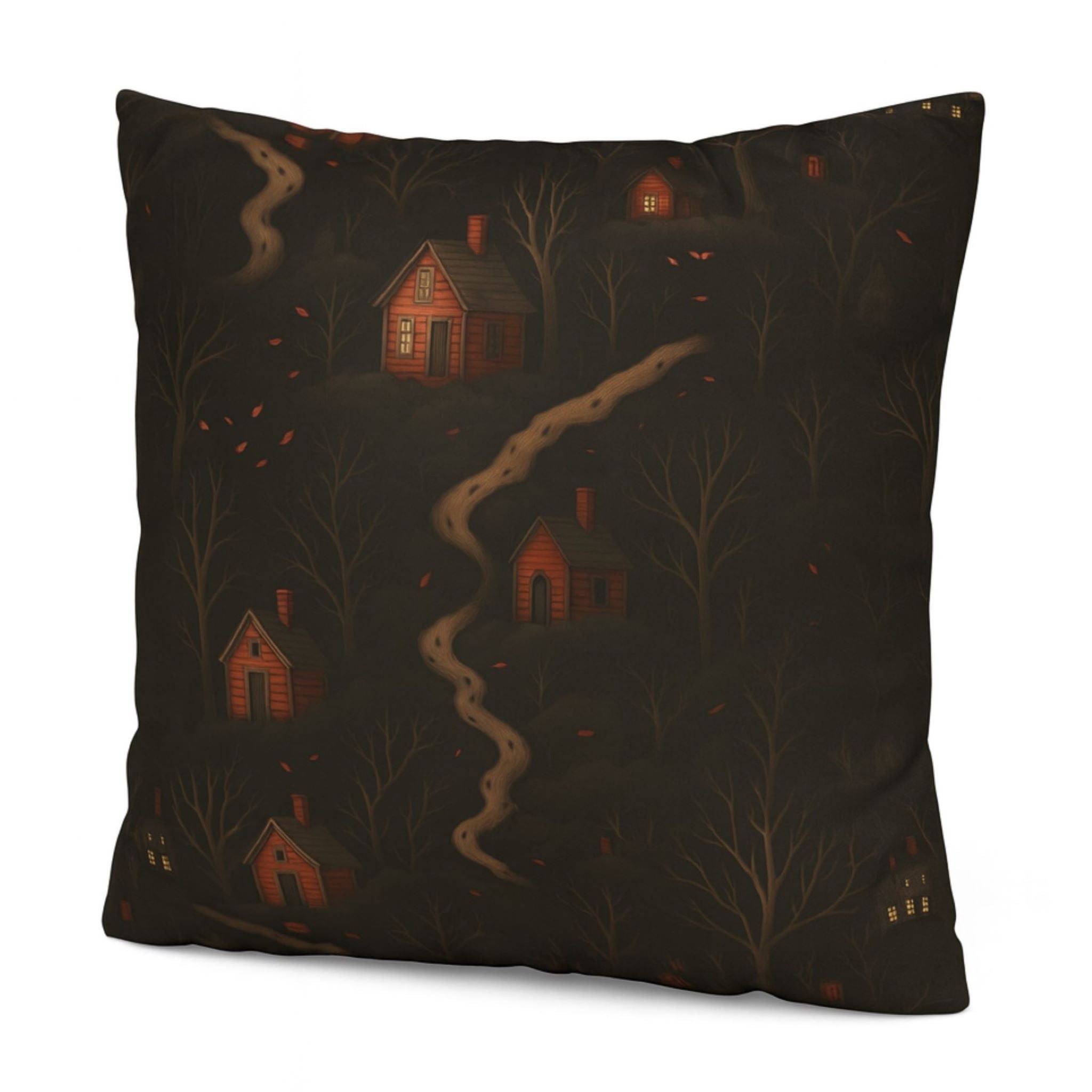 Decorative pillow with an autumn forest scene and small houses on a dark background