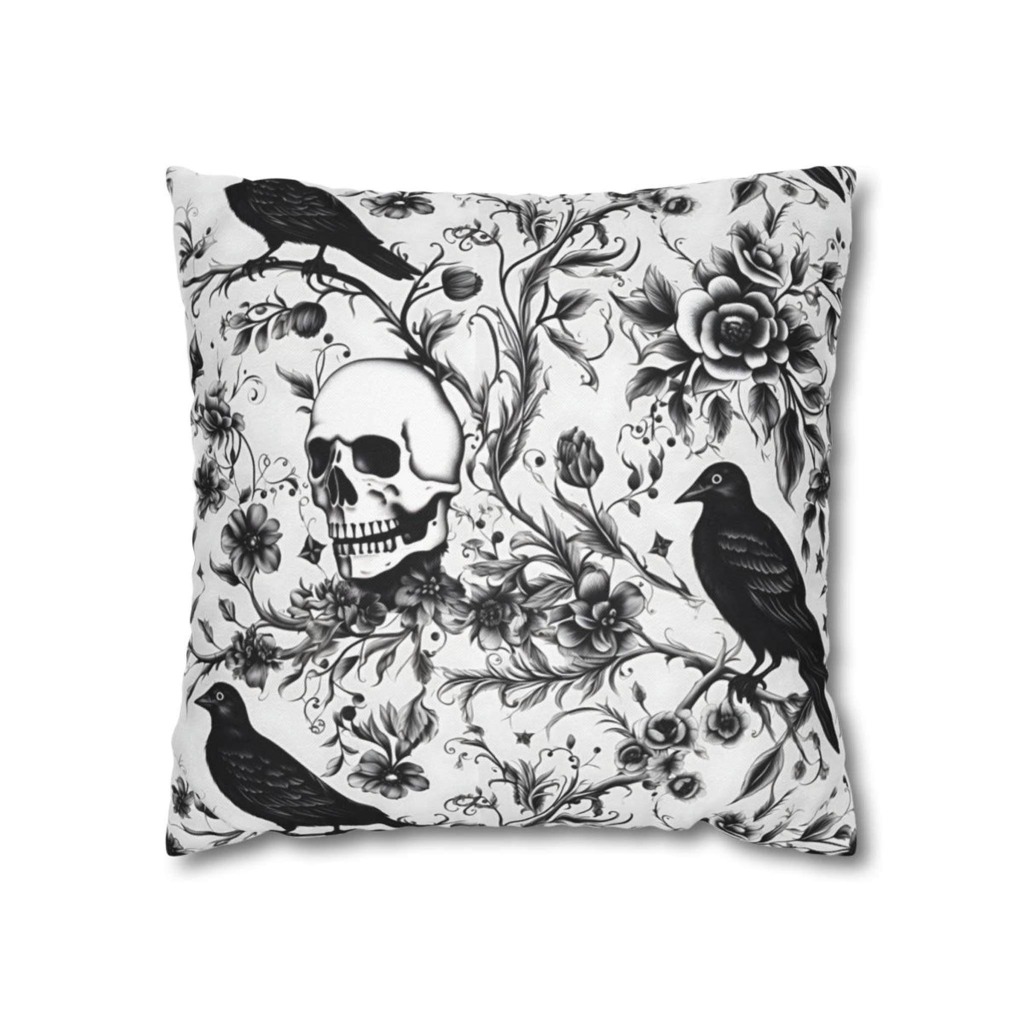Decorative pillow with skull and floral design on a white background