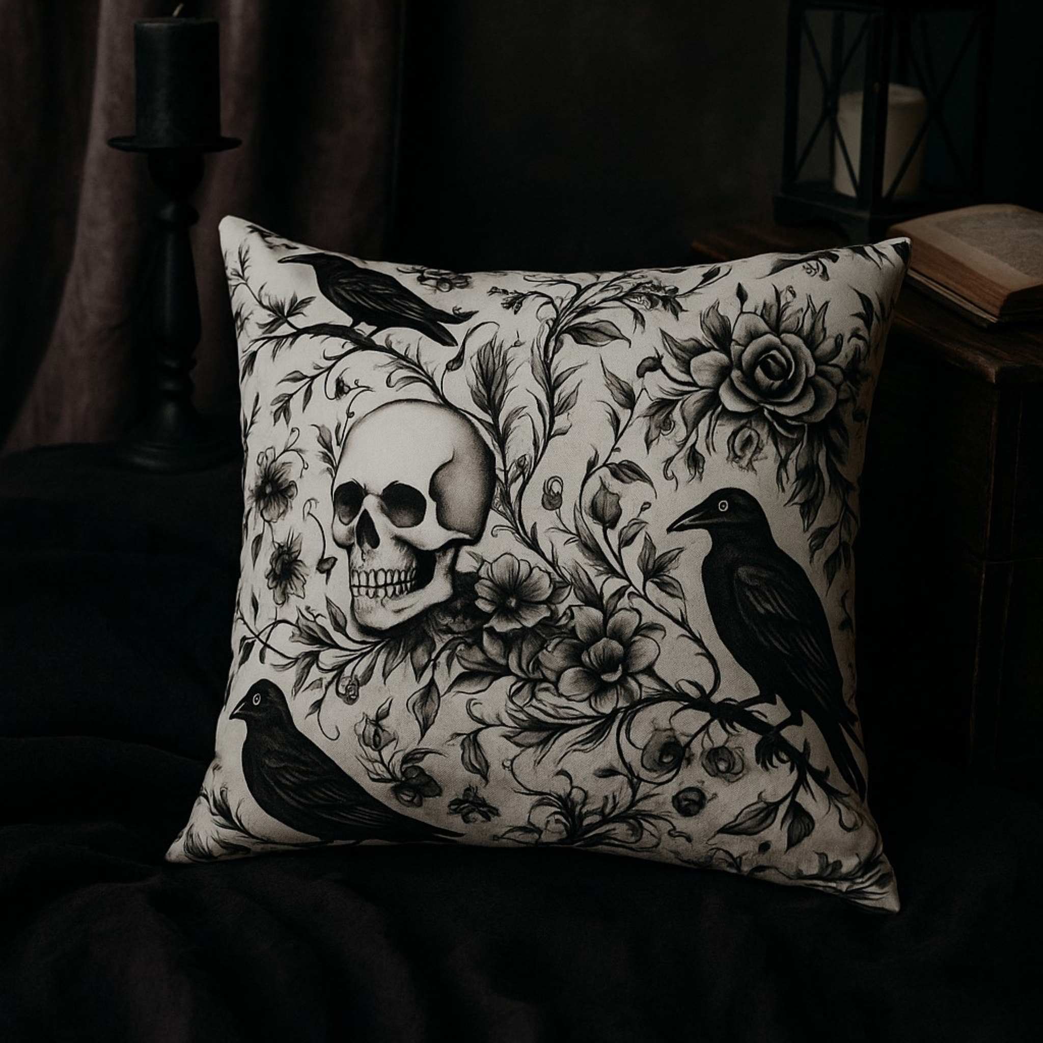 Decorative pillow with skull and bird design on a dark background