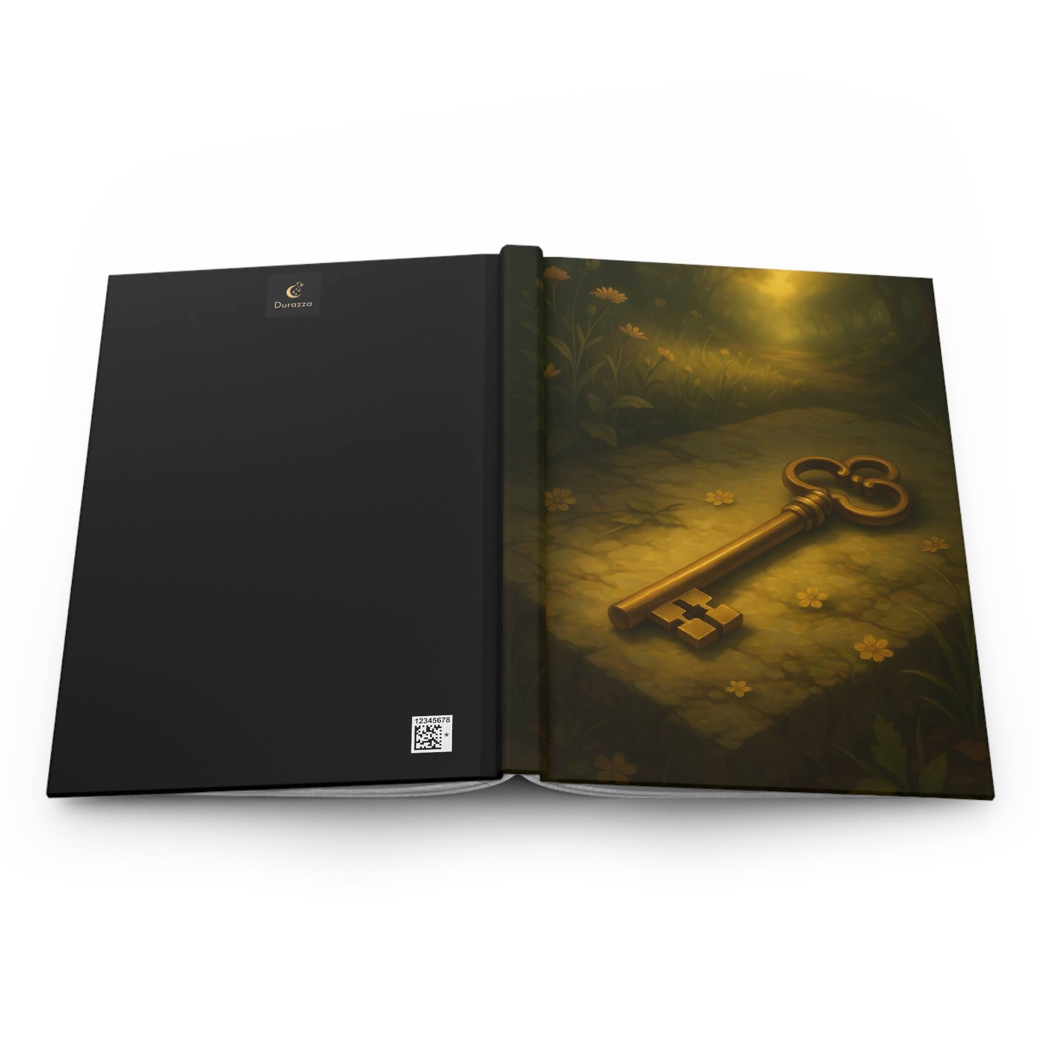 Open book with a dark cover featuring a gold key and floral design on a white background