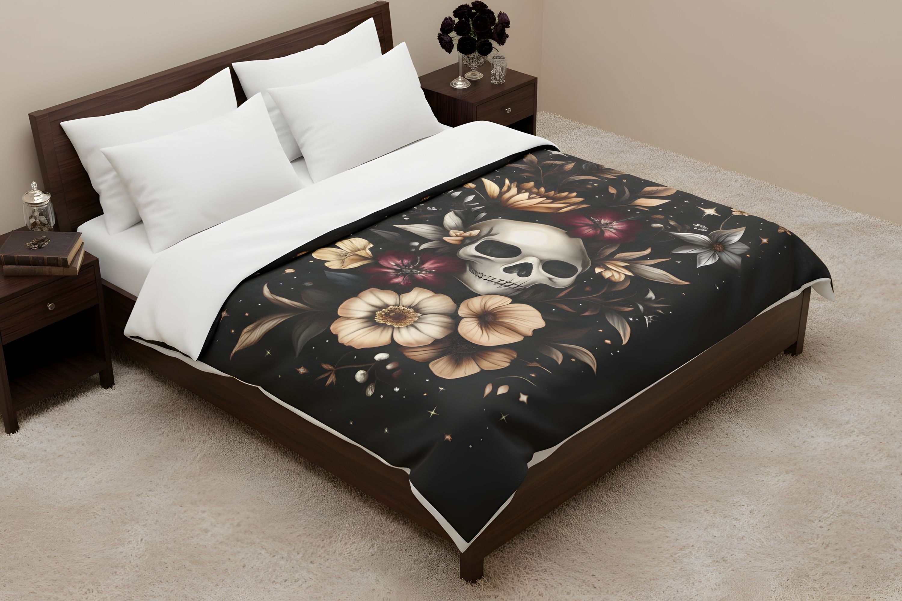 Dark floral velveteen throw blanket on bed with skull artwork, warm neutral flowers, and black background.
