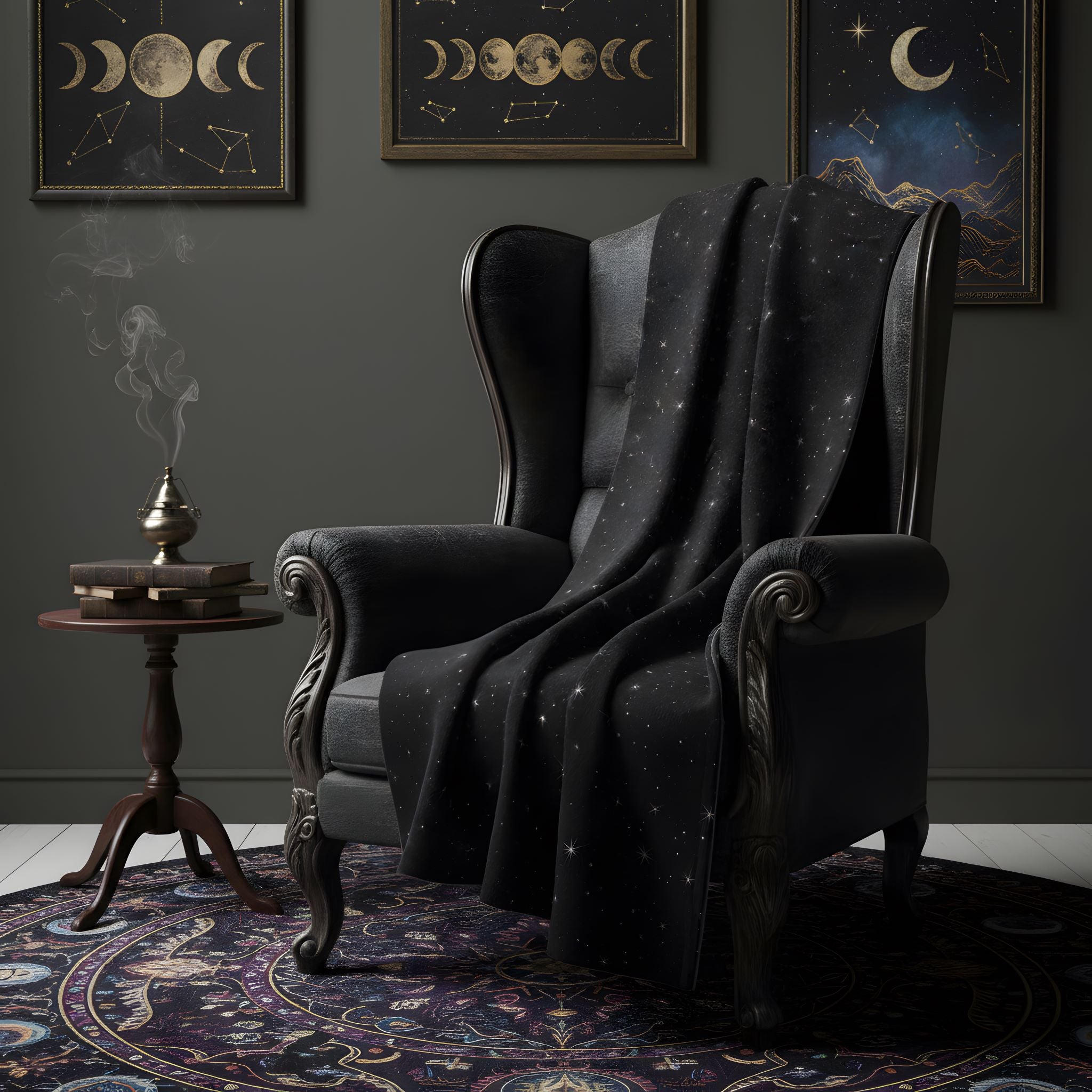Black celestial throw blanket draped over a gothic chair in a whimsigoth room with moon phase art.