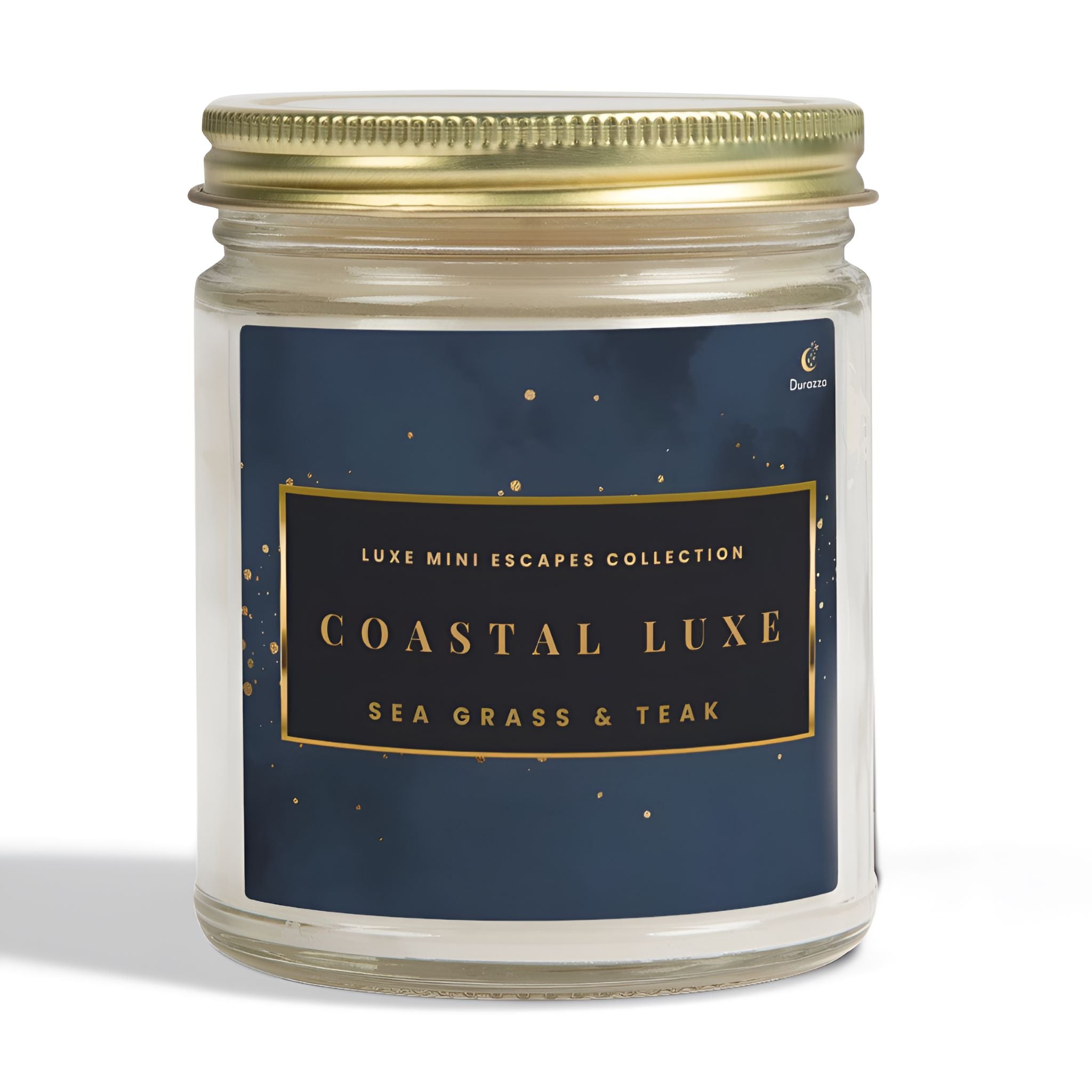 Beach scented candle jar with a gold lid and 'Coastal Luxe' label on a white background
