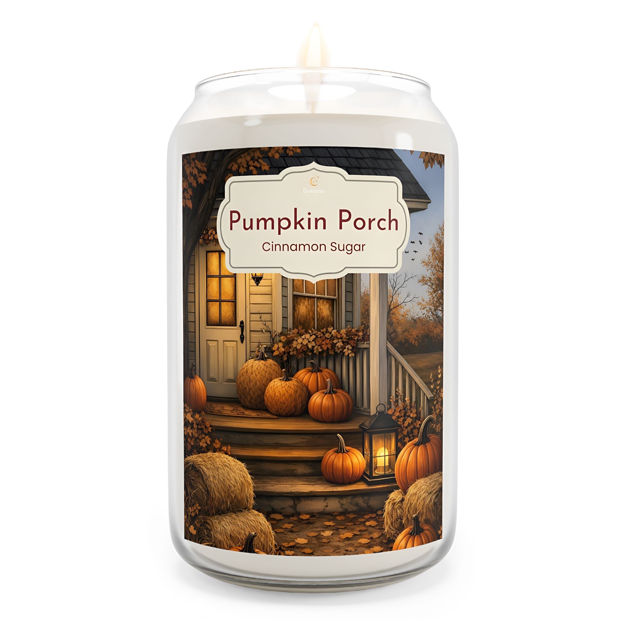 A cinnamon and sugar candle with 'Pumpkin Porch' label featuring pumpkins and a house on the label.