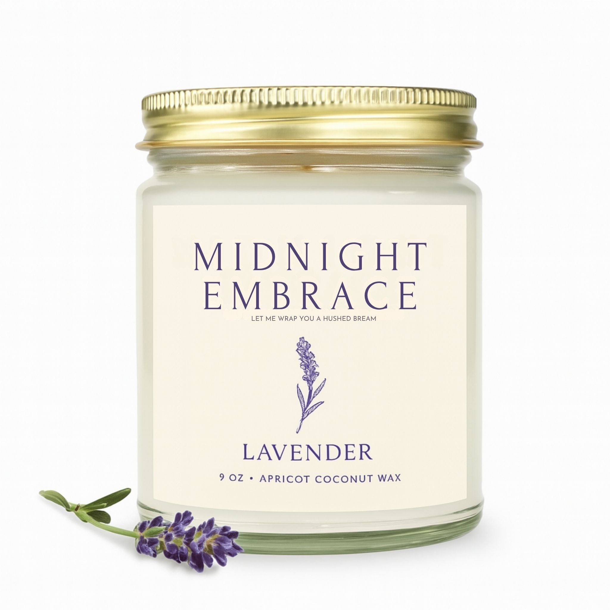9 oz Lavender scented candle in a  clear glass jar with gold lid on a white background.