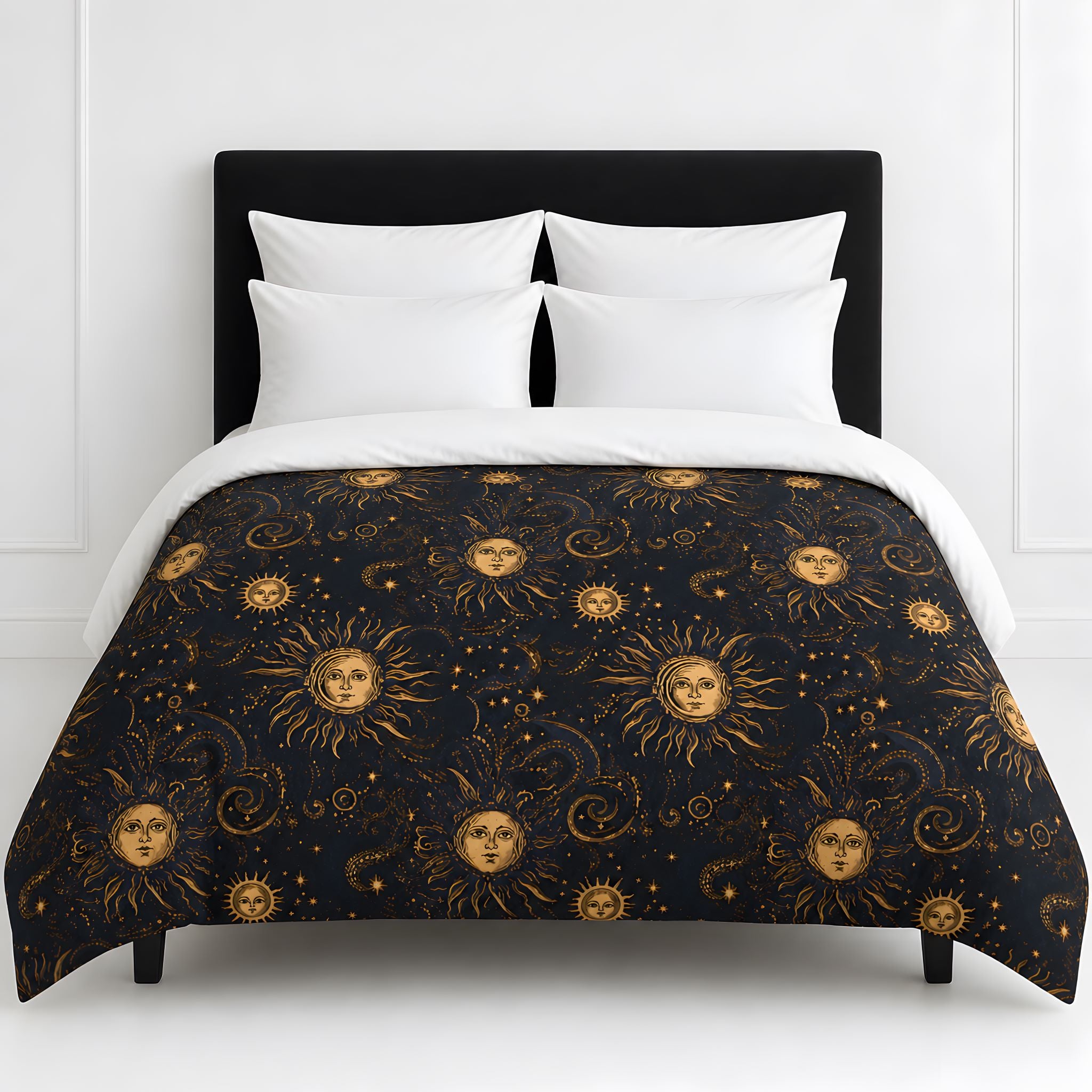 Sun and moon duvet cover in black and gold celestial bedding on a white bed.