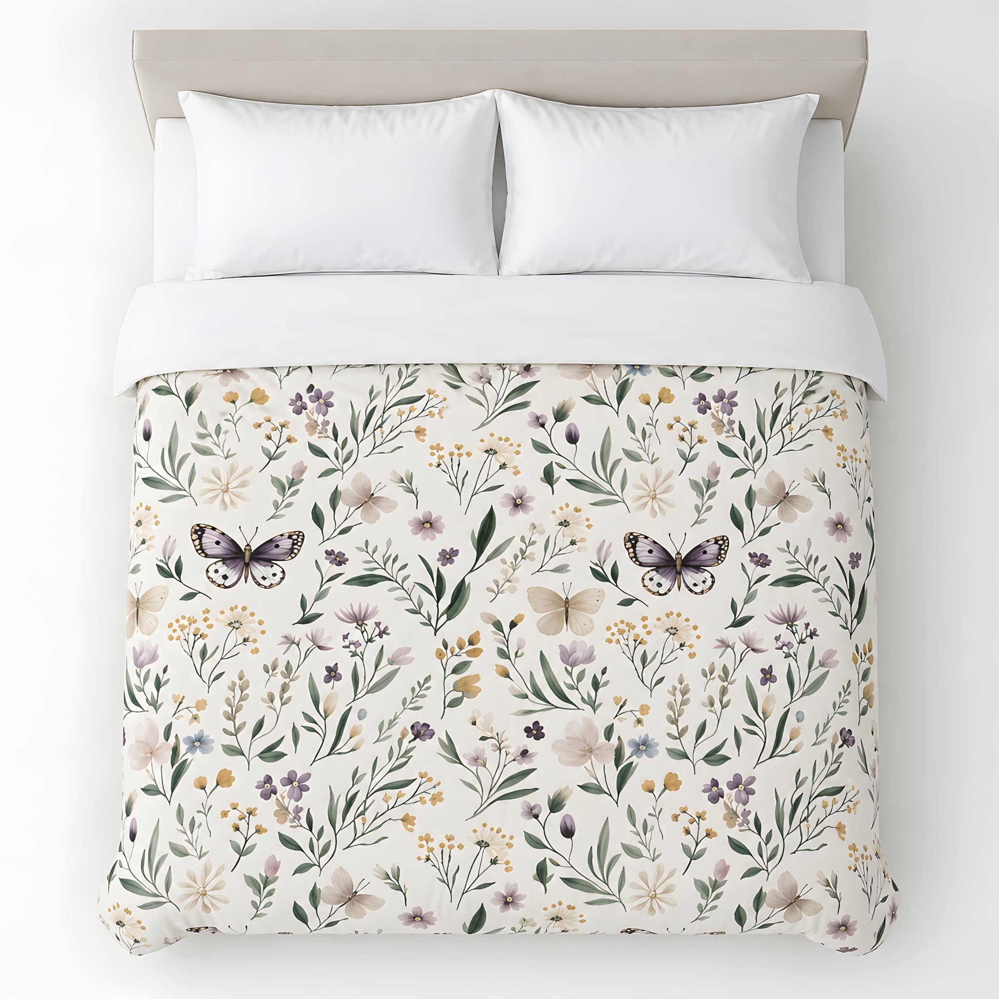 Bed with floral and butterfly patterned bedding on a white background