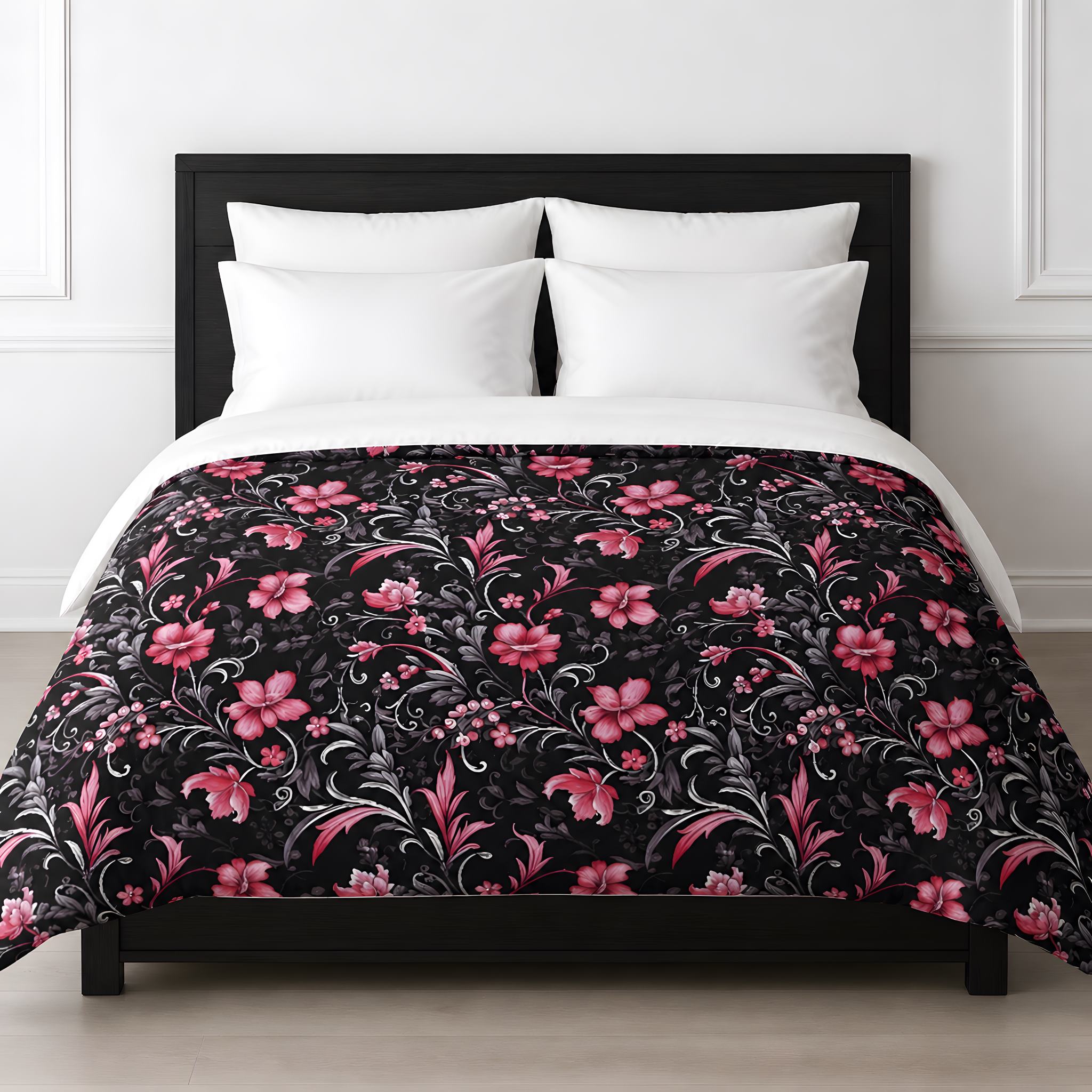 Pink and white floral duvet cover on a black bed.