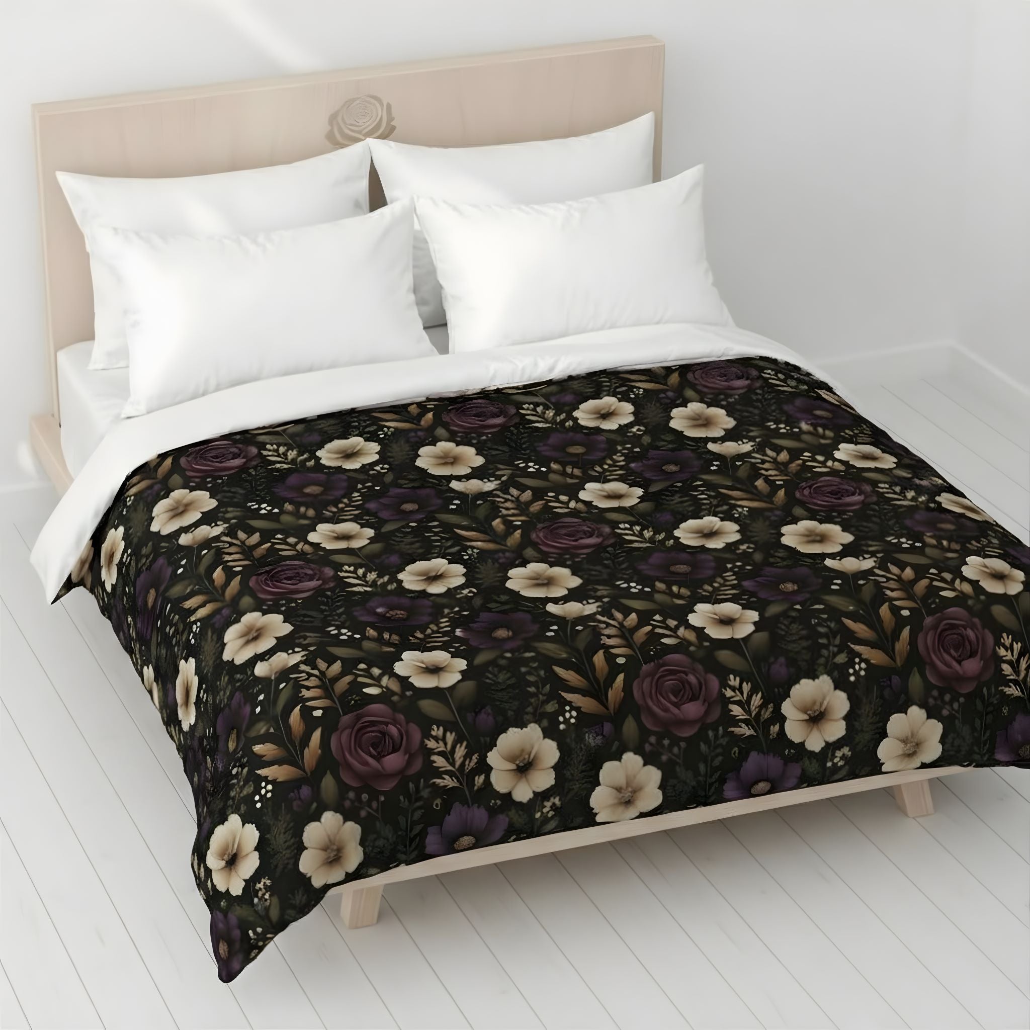 Plum rose duvet cover with ivory flowers on a bed in a white room.