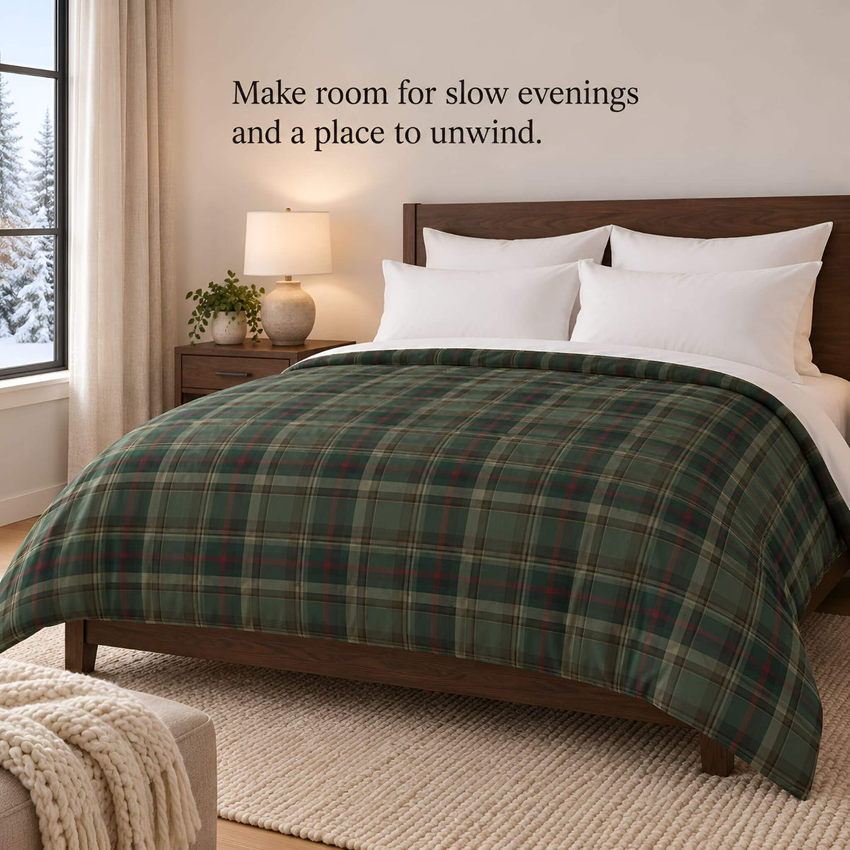 Full bedroom view of the Cedar Ember cotton duvet cover, with forest-green tartan plaid against white pillows.