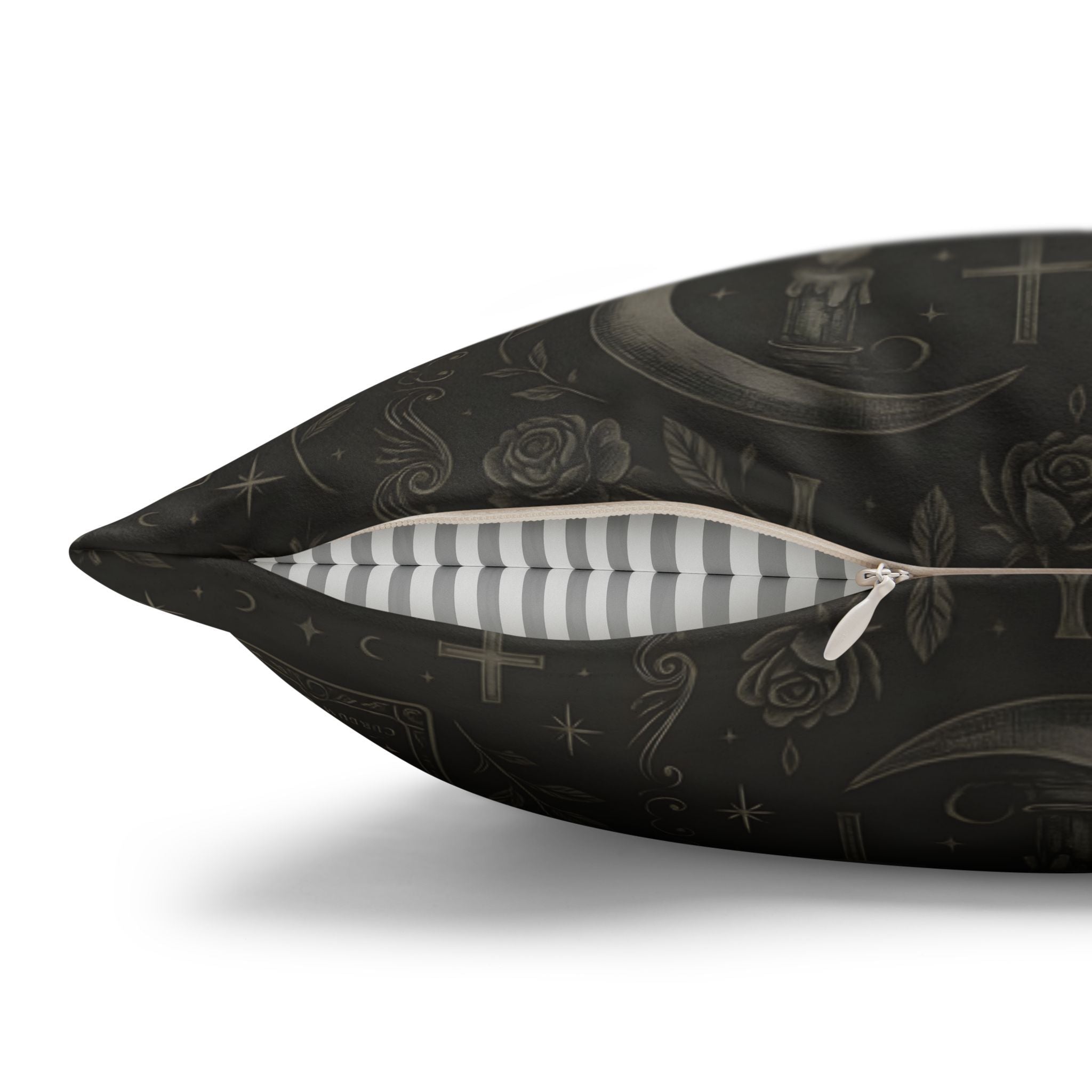 Decorative pillow with black and white design on a white background