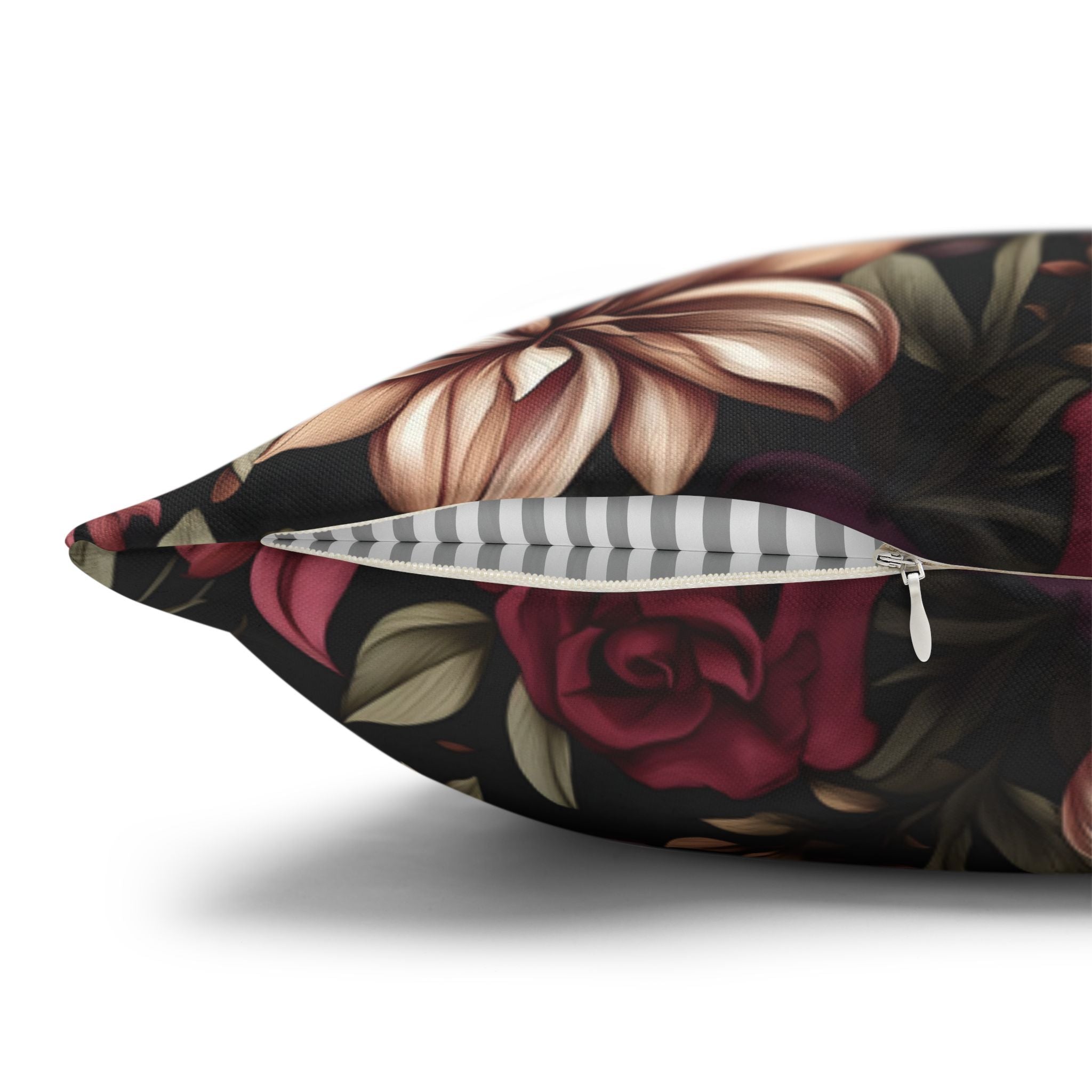 Floral-patterned pillow with a zipper on a white background