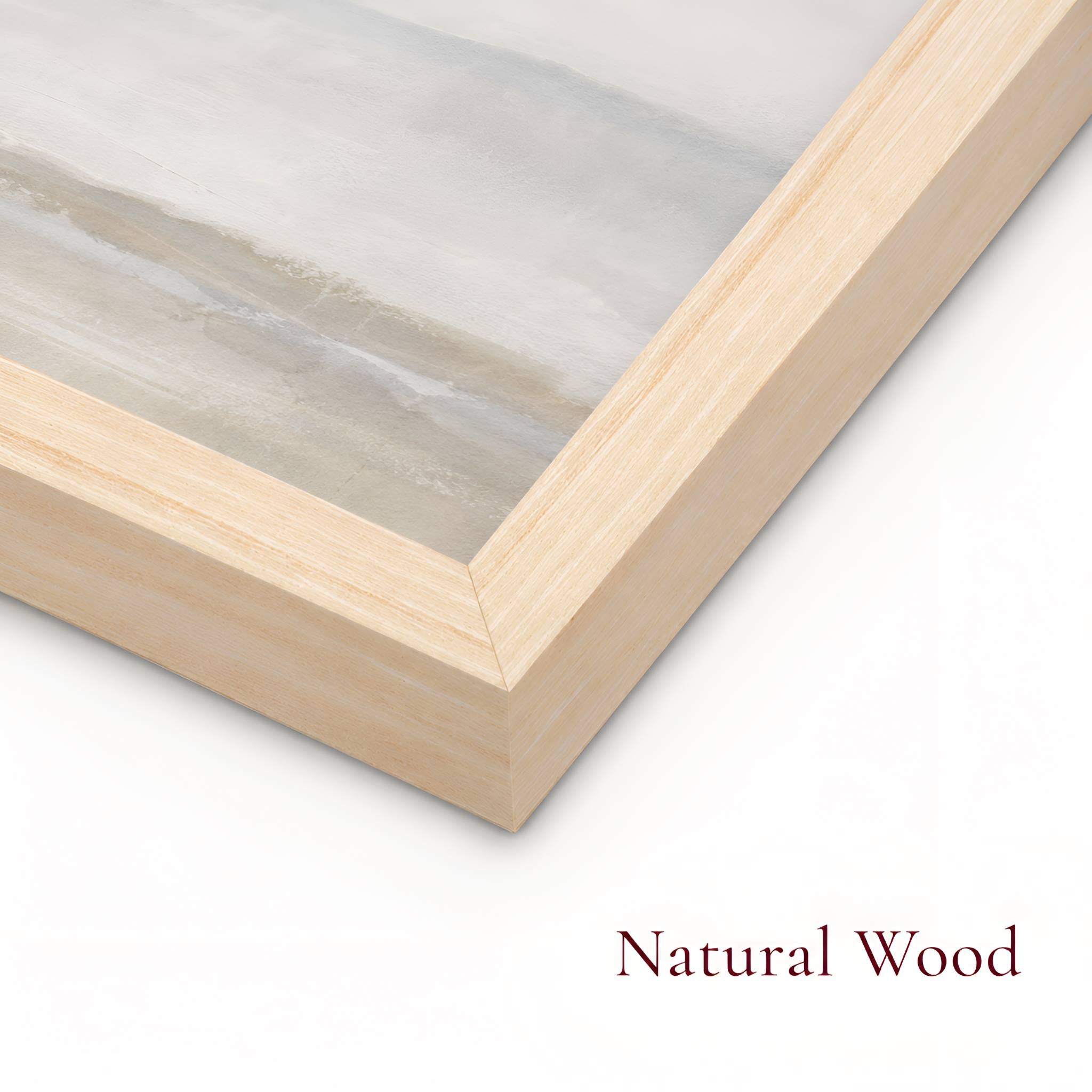 Natural wood fine art frame corner close-up with textured art paper.