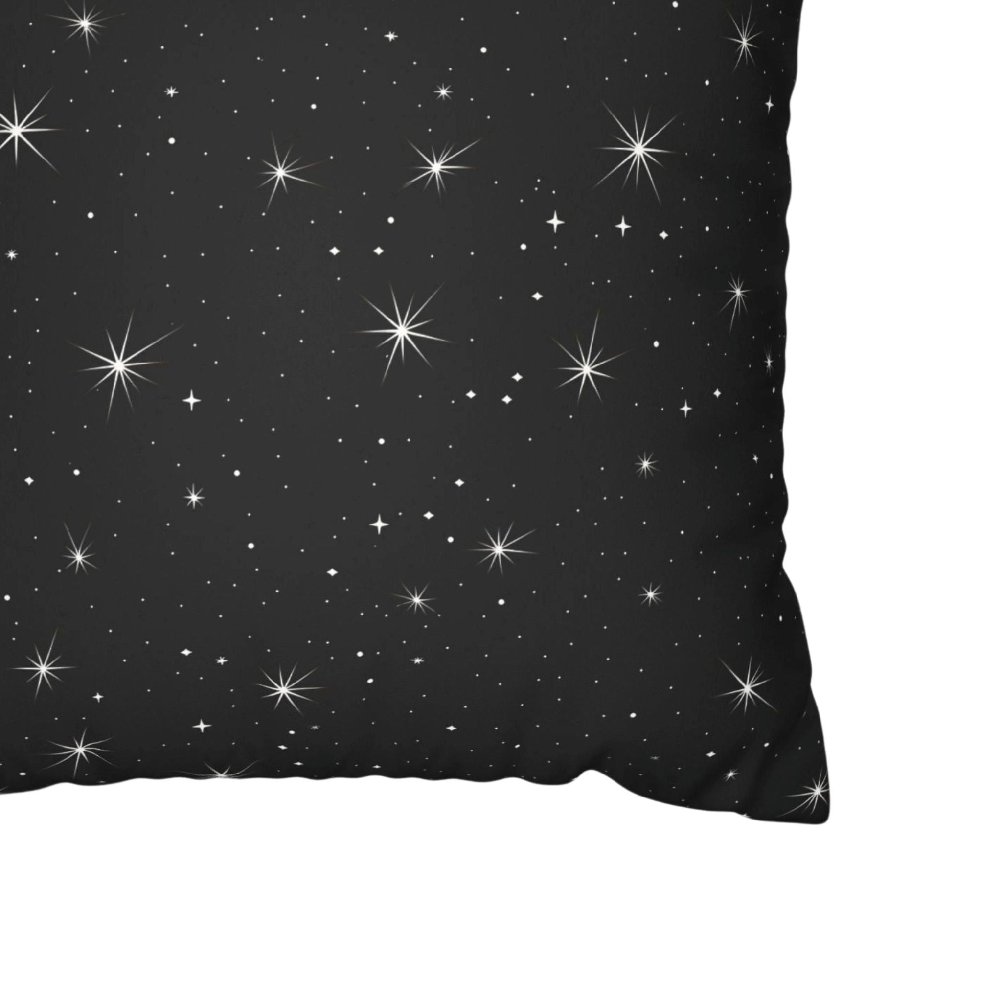 Closeup of black celestial faux suede pillow cover.