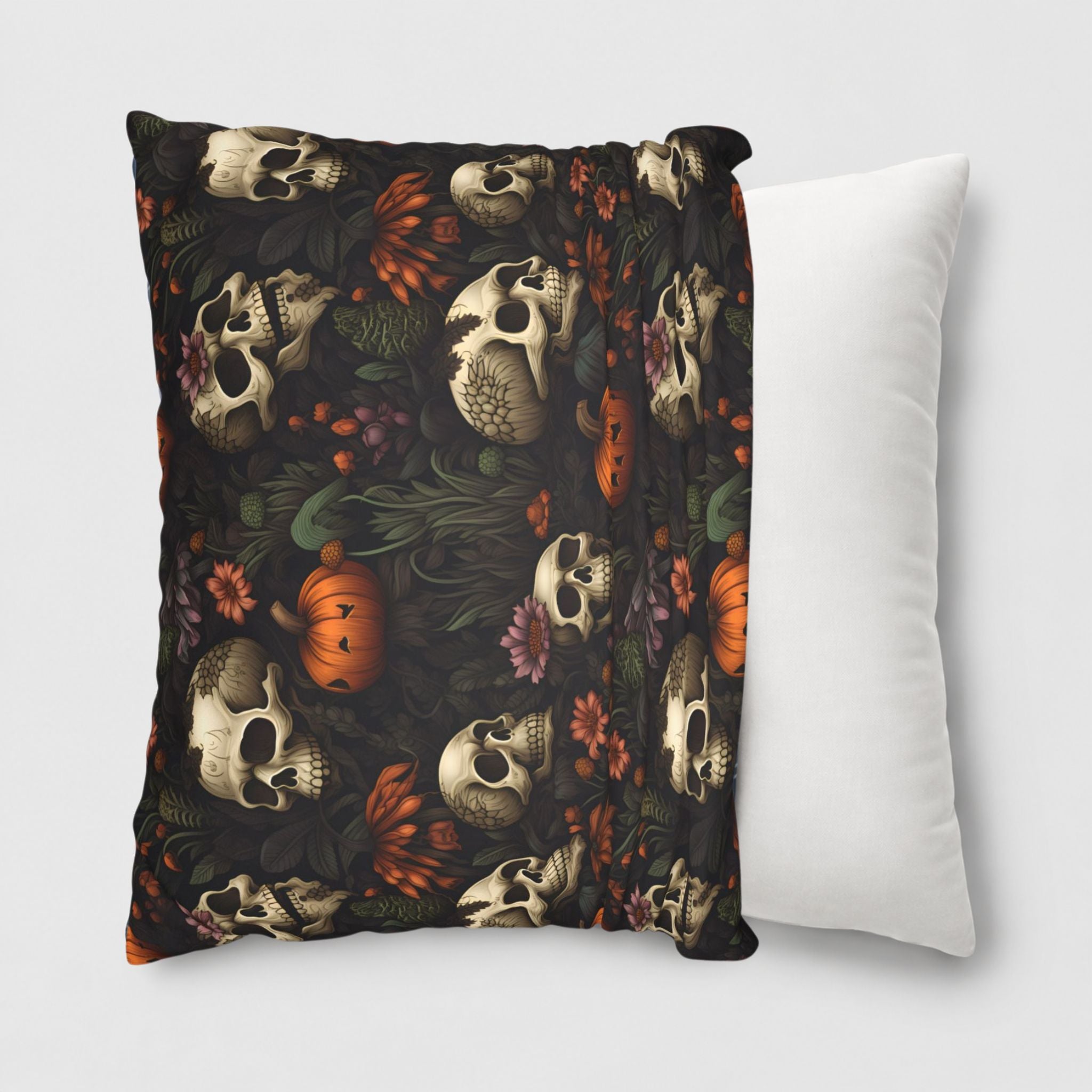 Autumn pumpkins and skull design on a faux suede pillow cover being slipped onto a throw pillow.