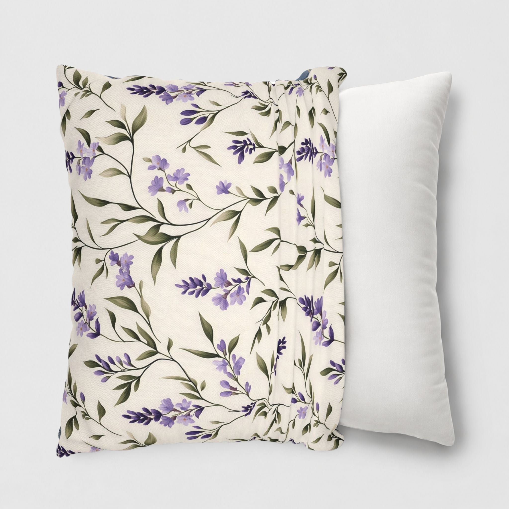 Floral lavender pillow cover being slid onto a 20-inch throw pillow. 