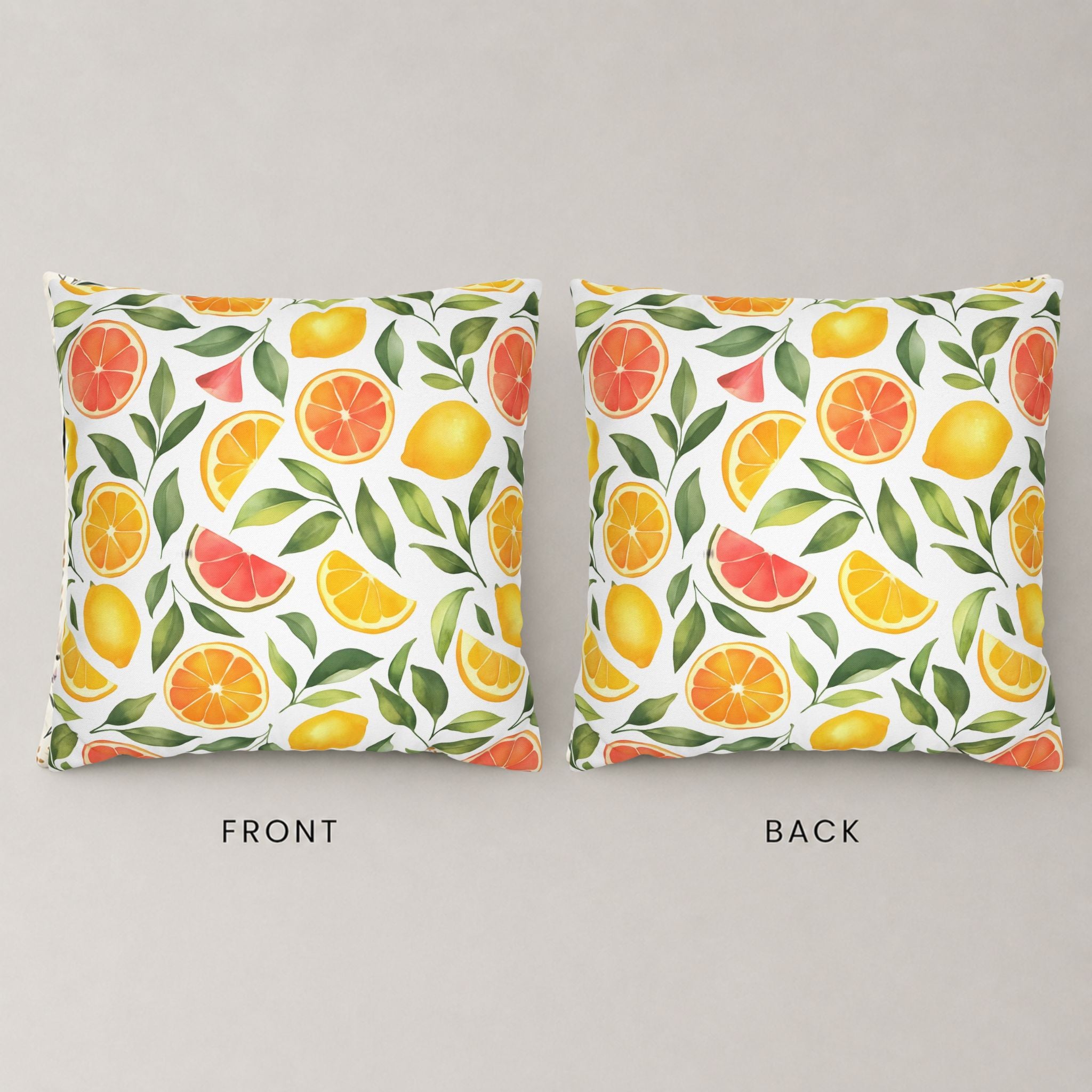 Front and backside of a citrus grove pillow cover featuring lemons, oranges and pink grapefruit.