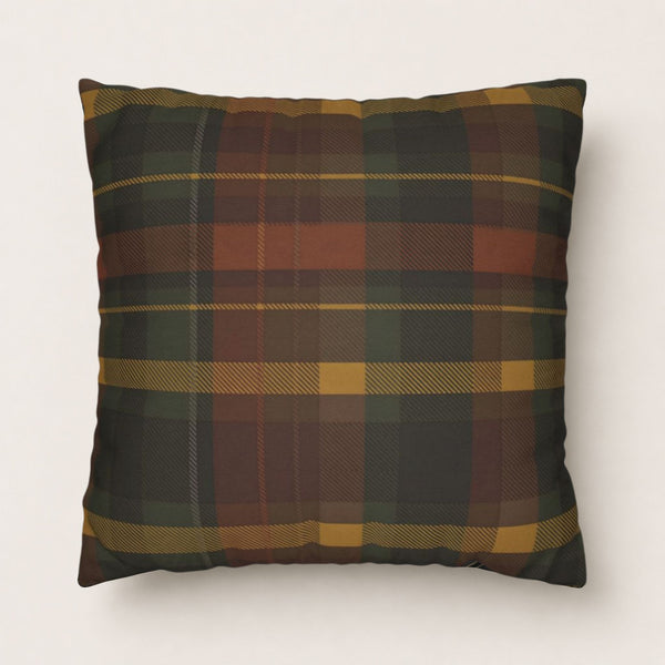 Autumn plaid pillow with green, brown, and yellow colors on a white background