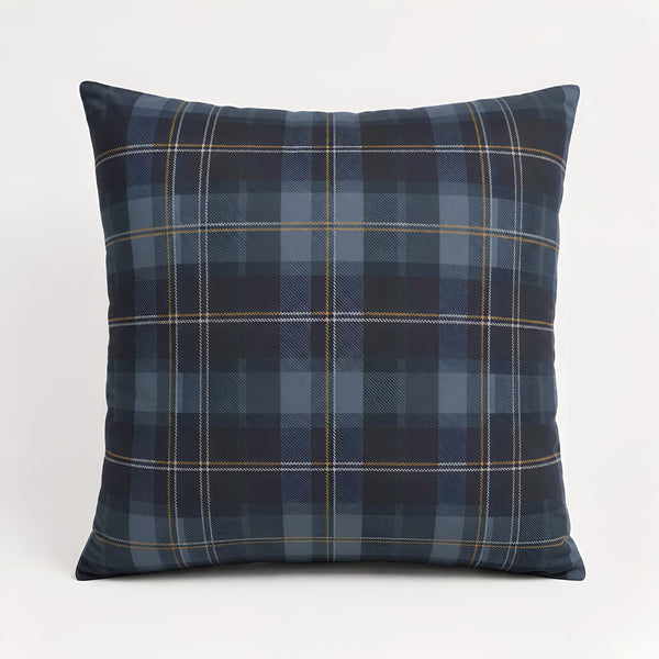 Plaid pillow with blue and gray pattern on a white background