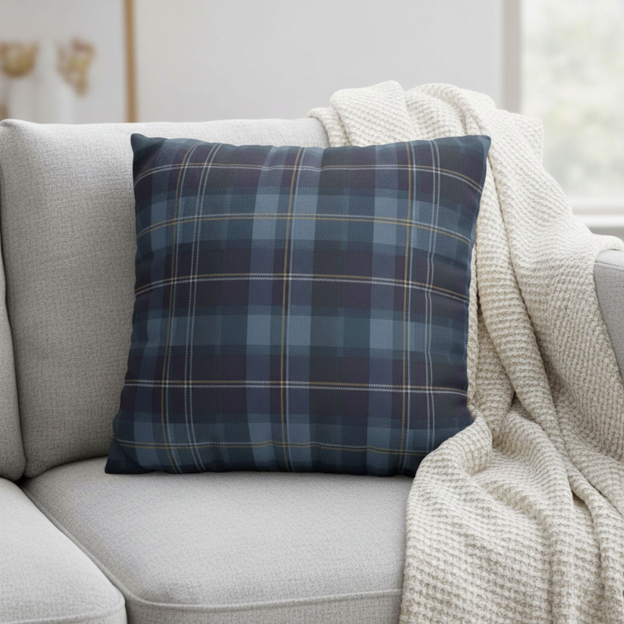 Tartan Plaid 18 inch pillow on a gray sofa with a beige blanket