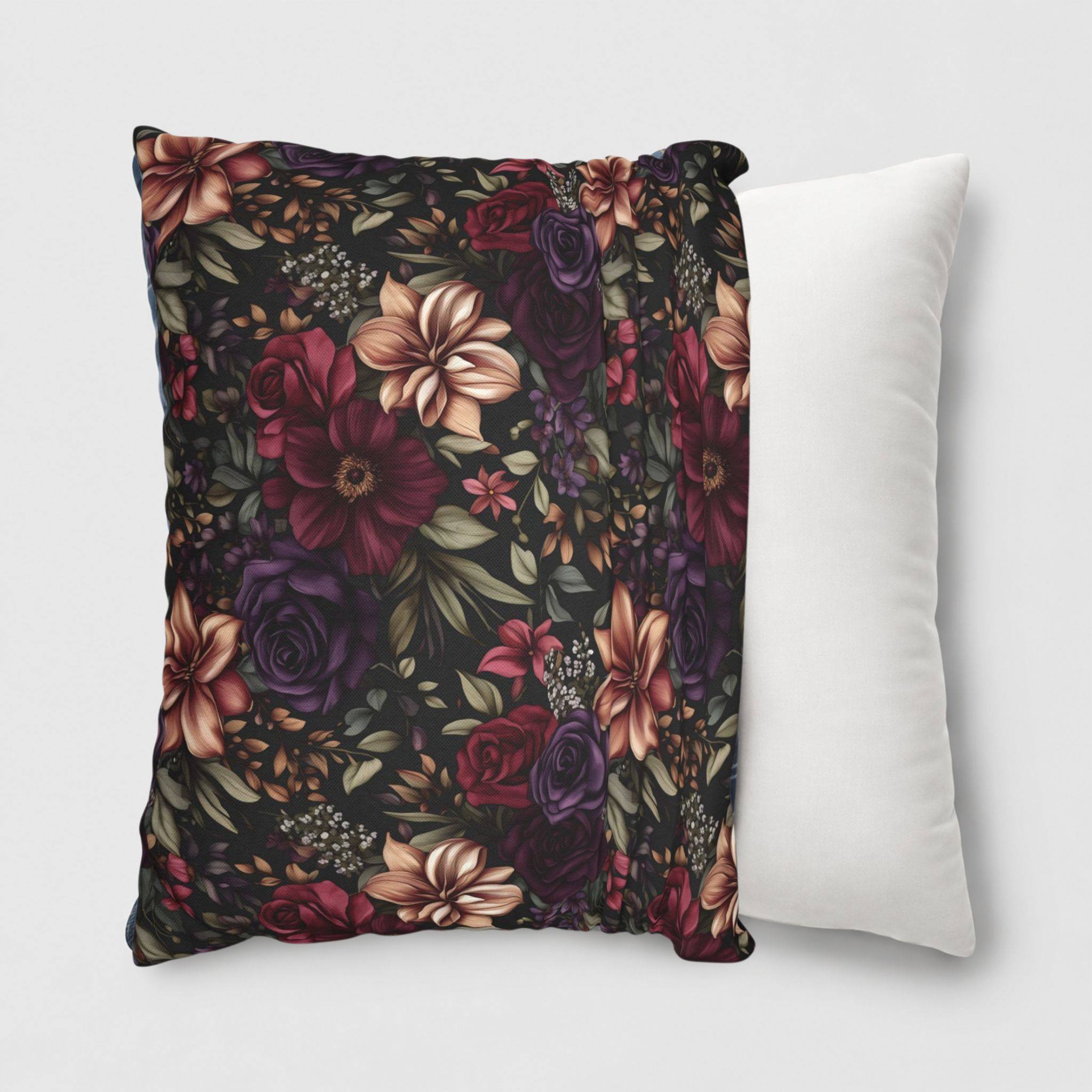 Dark floral pillow cover being put onto a 20 inch throw pillow.