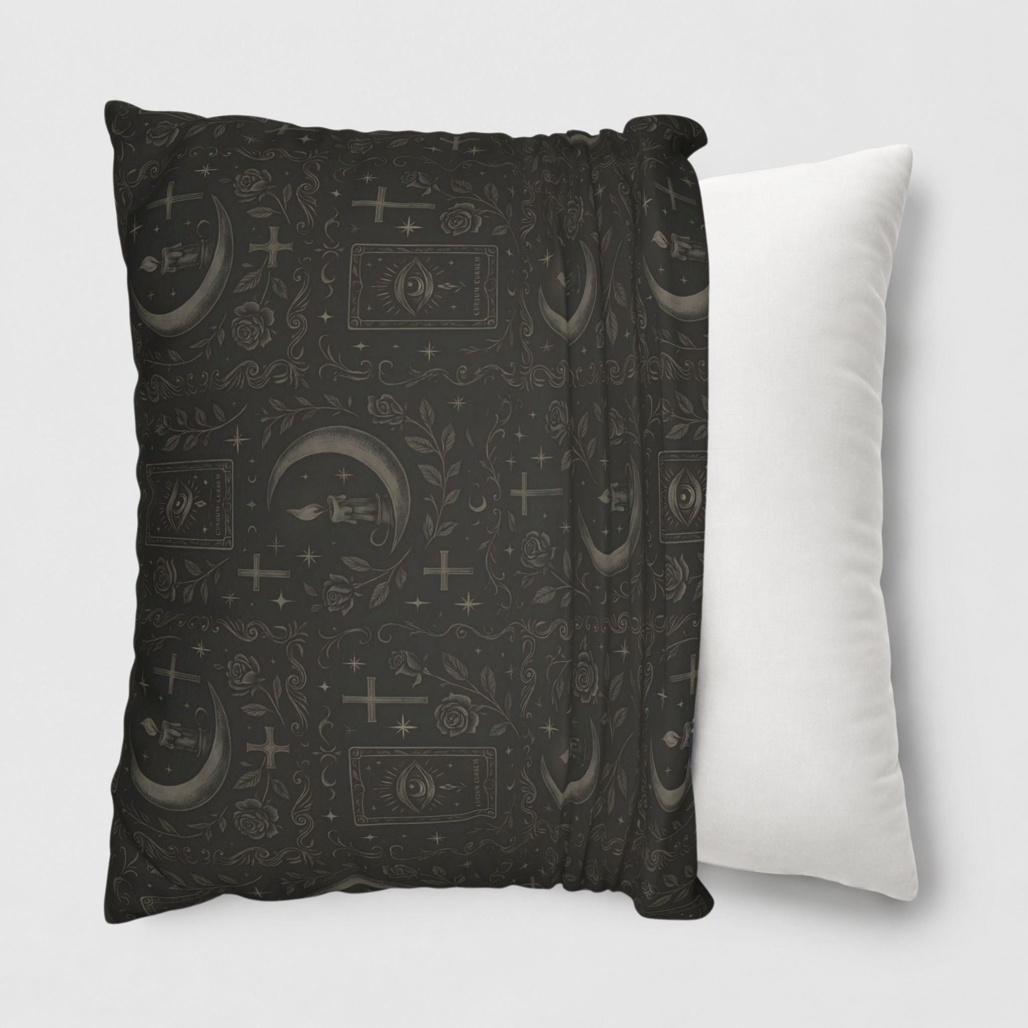 A pillow cover with celestial pattern being slid onto a 20 inch white throw pillow.